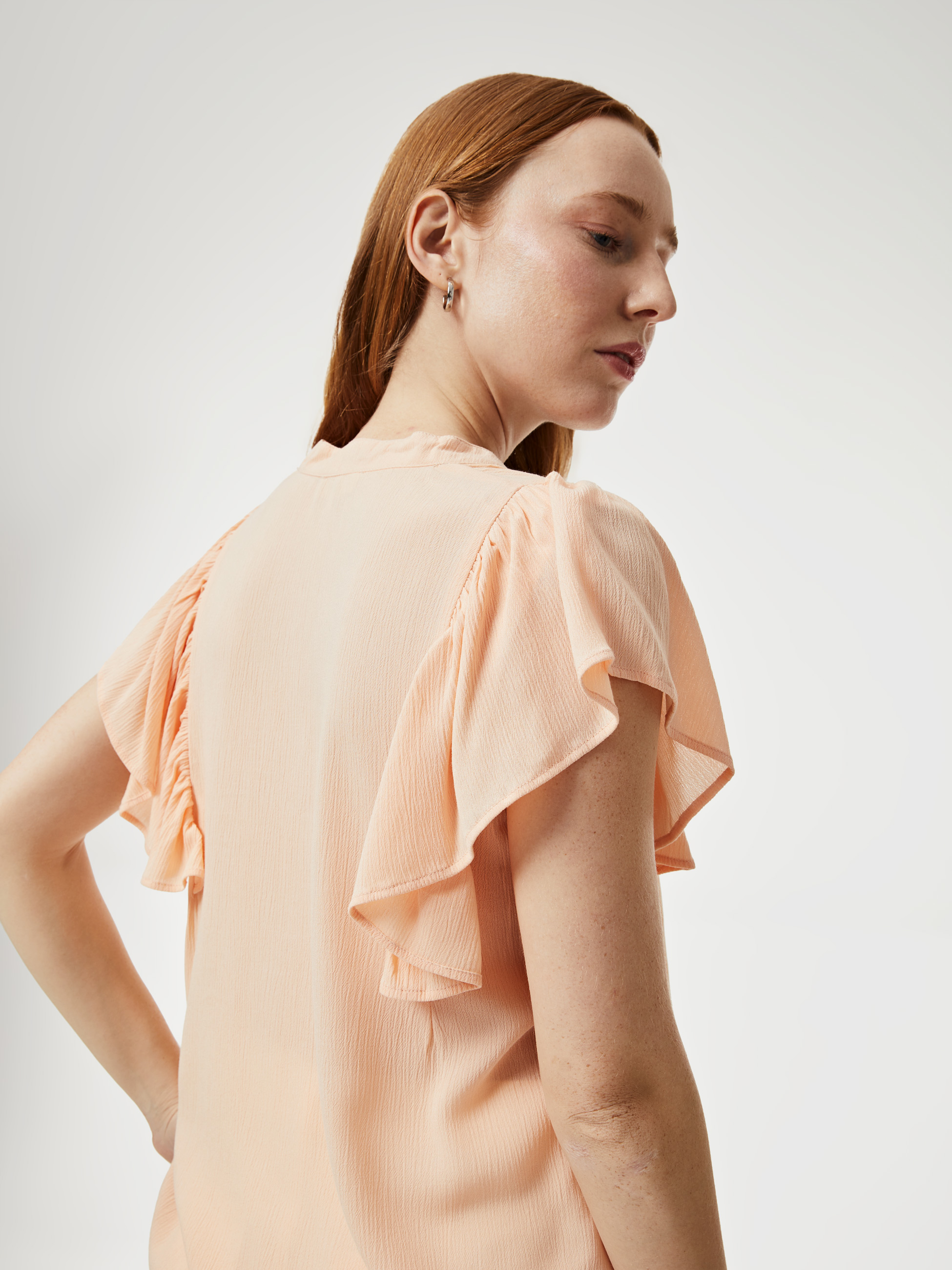 Blusa com folho nas mangas