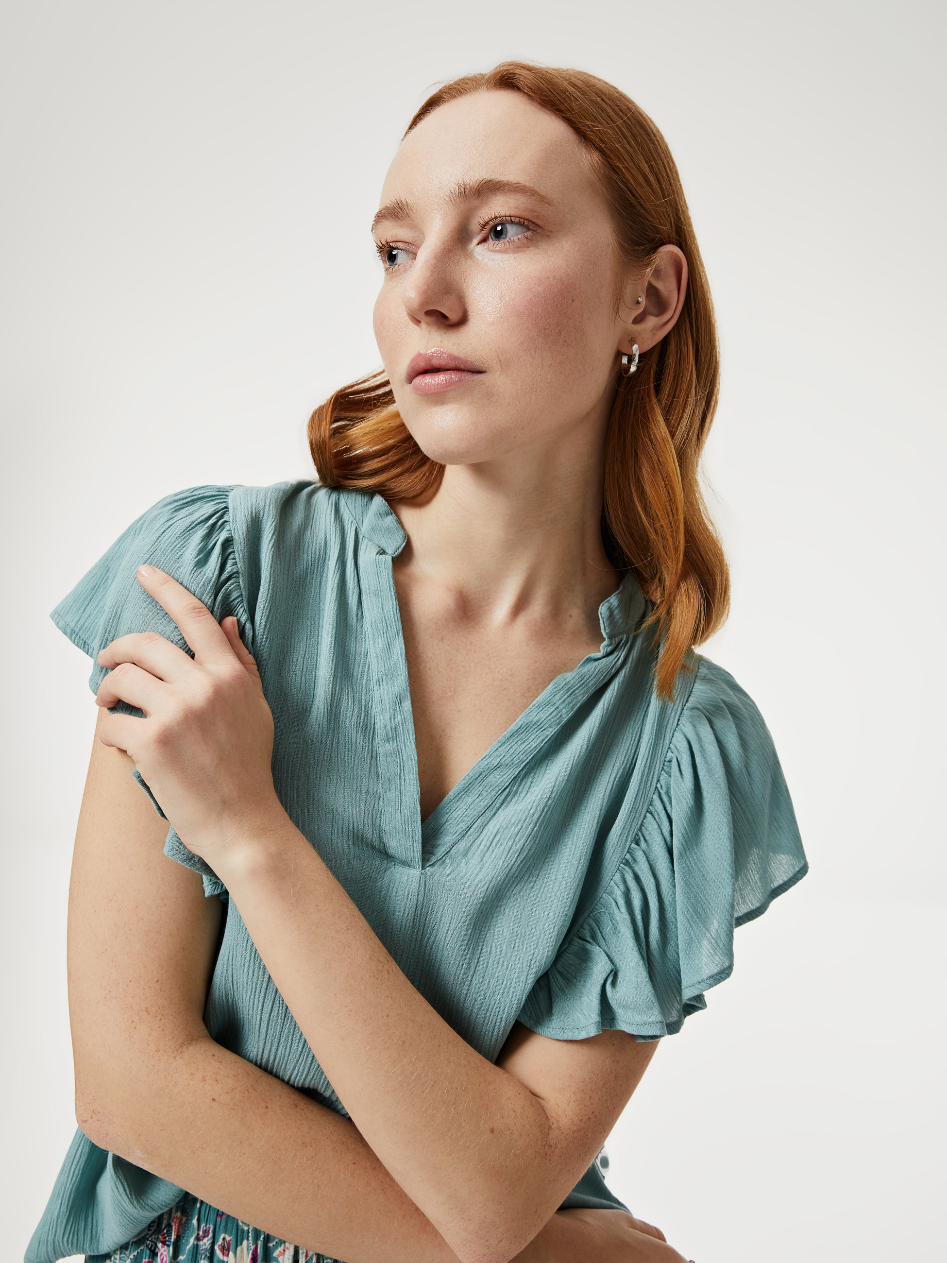 Blusa com folho nas mangas