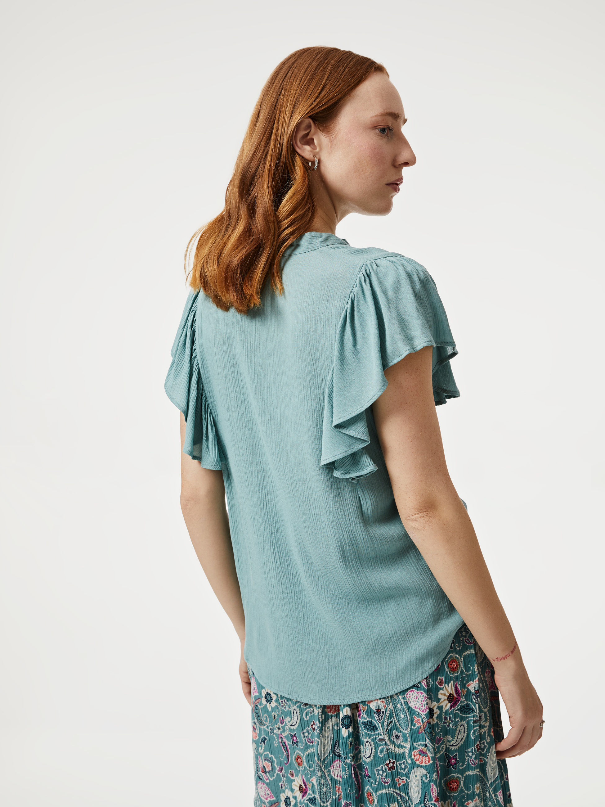 Blusa com folho nas mangas