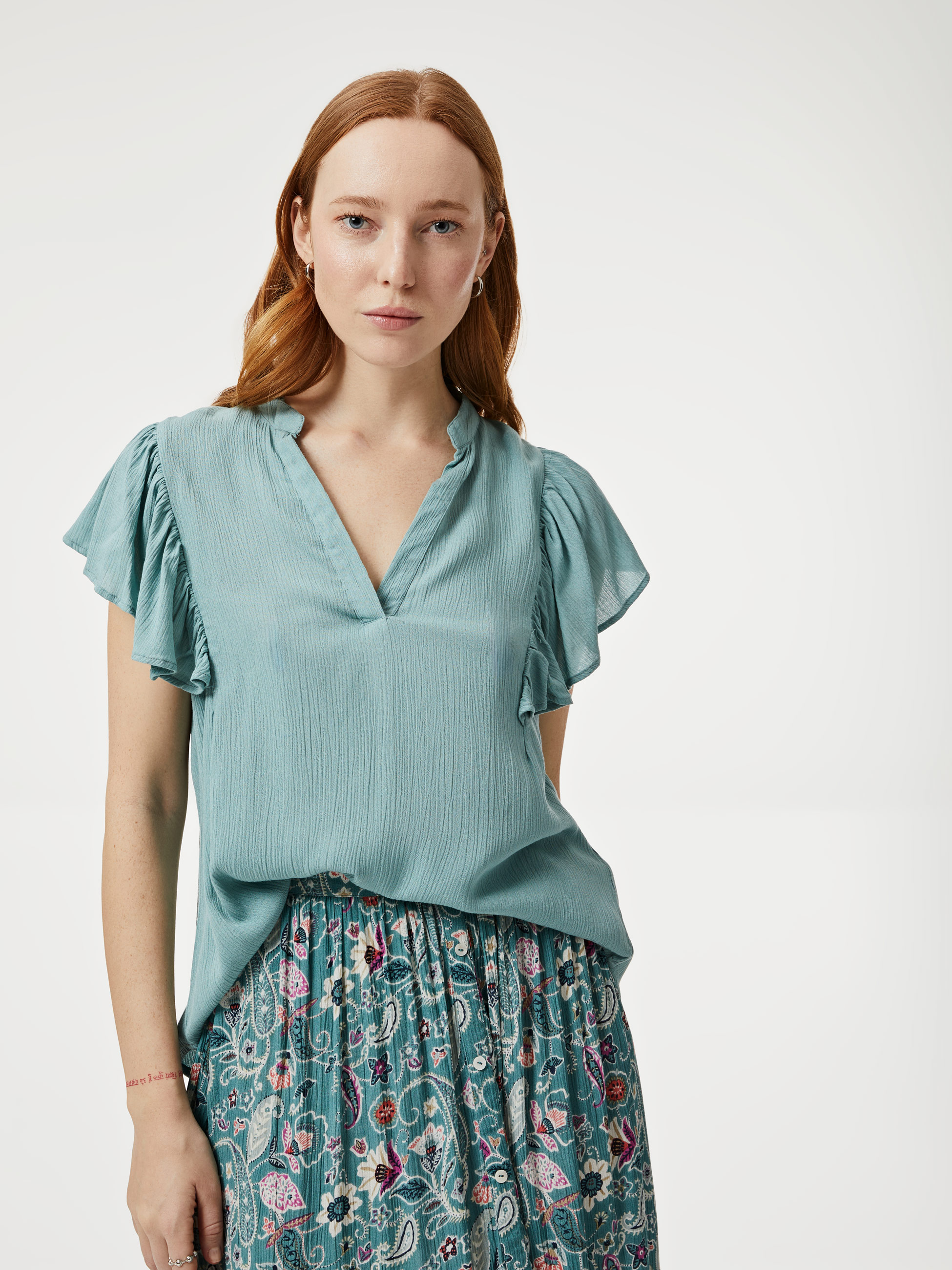 Blusa com folho nas mangas