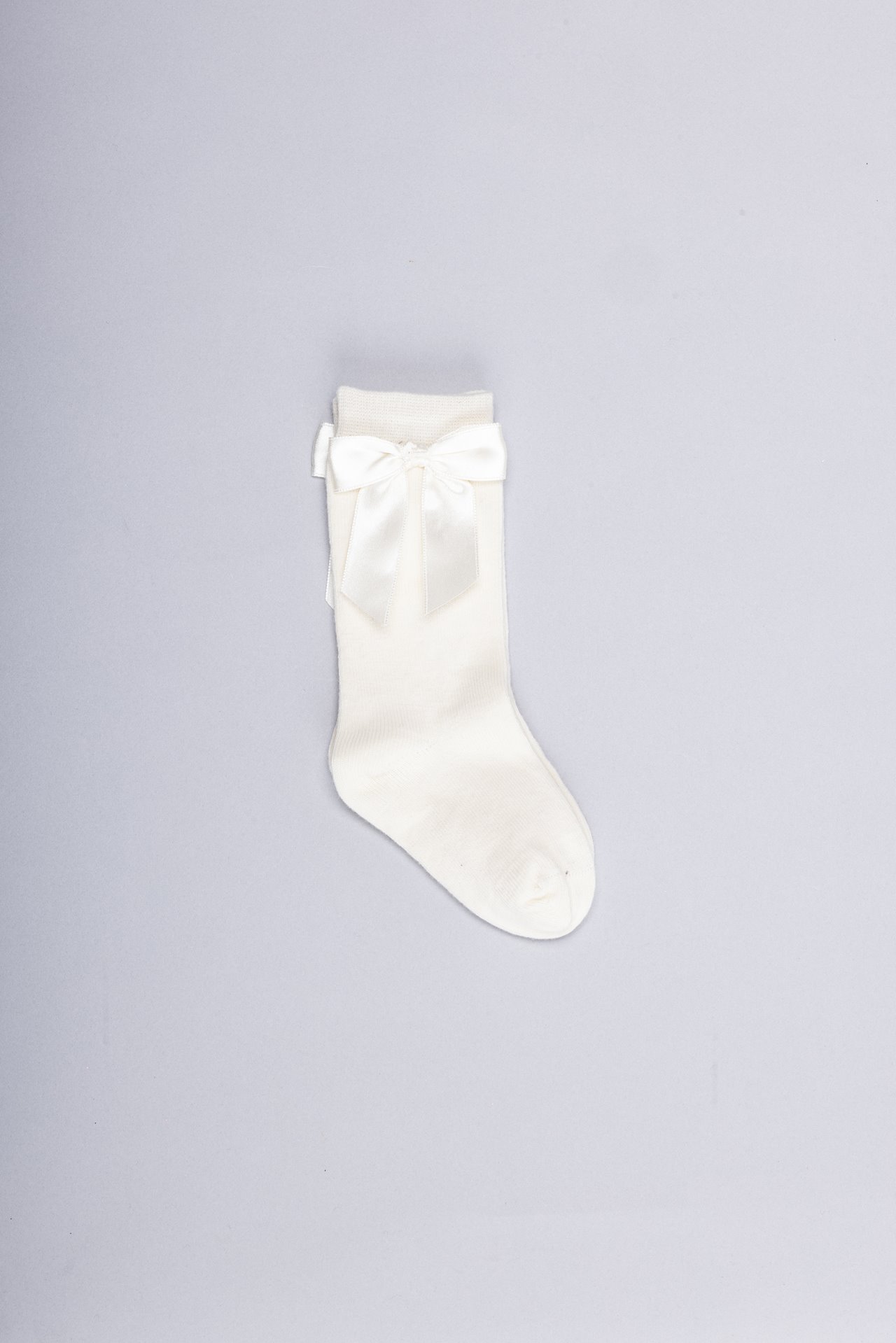 Meias altas com laço