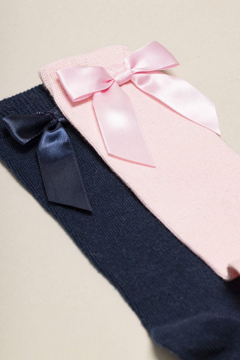 Meias altas com laço