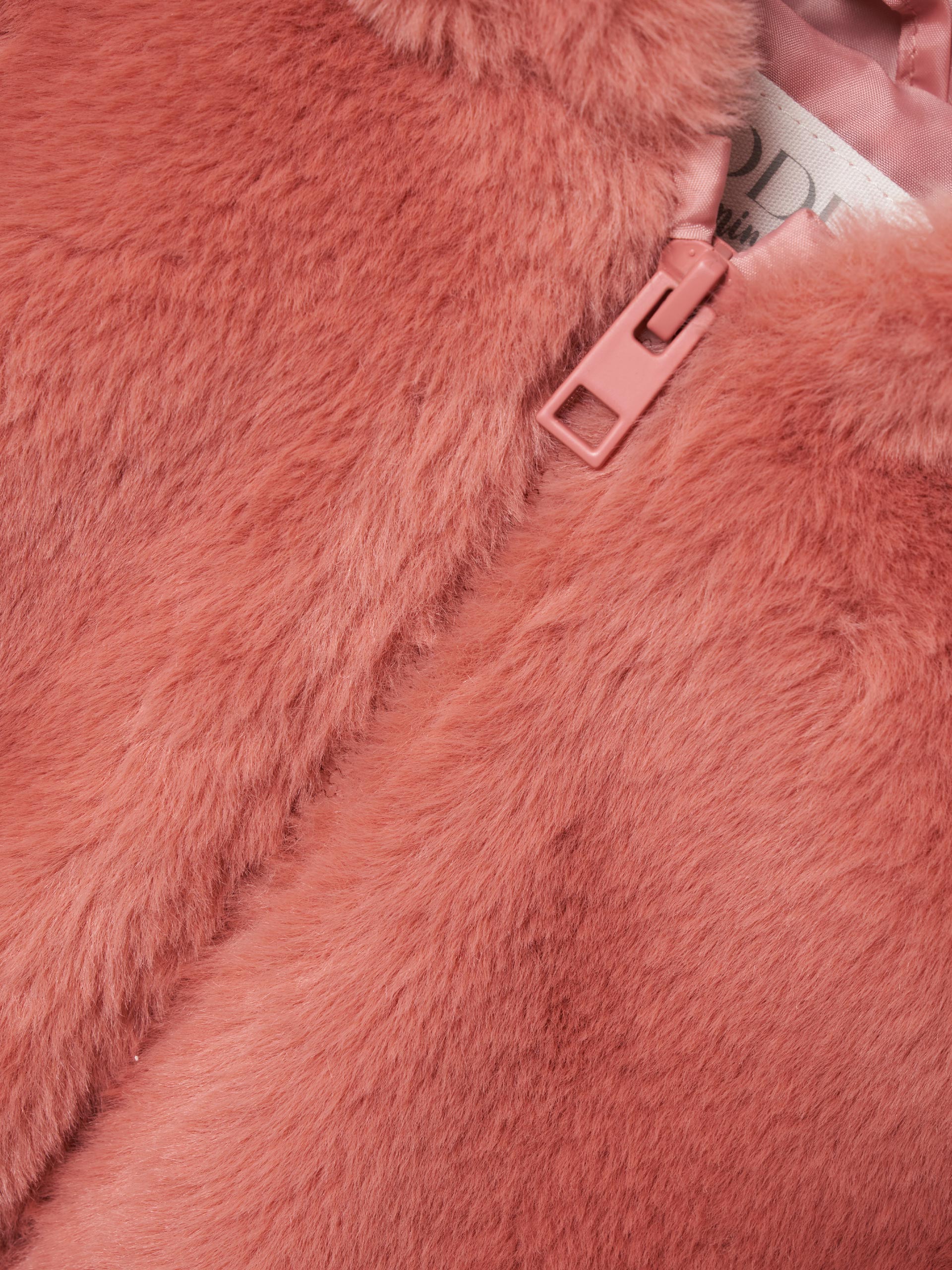 Colete pelo sintético