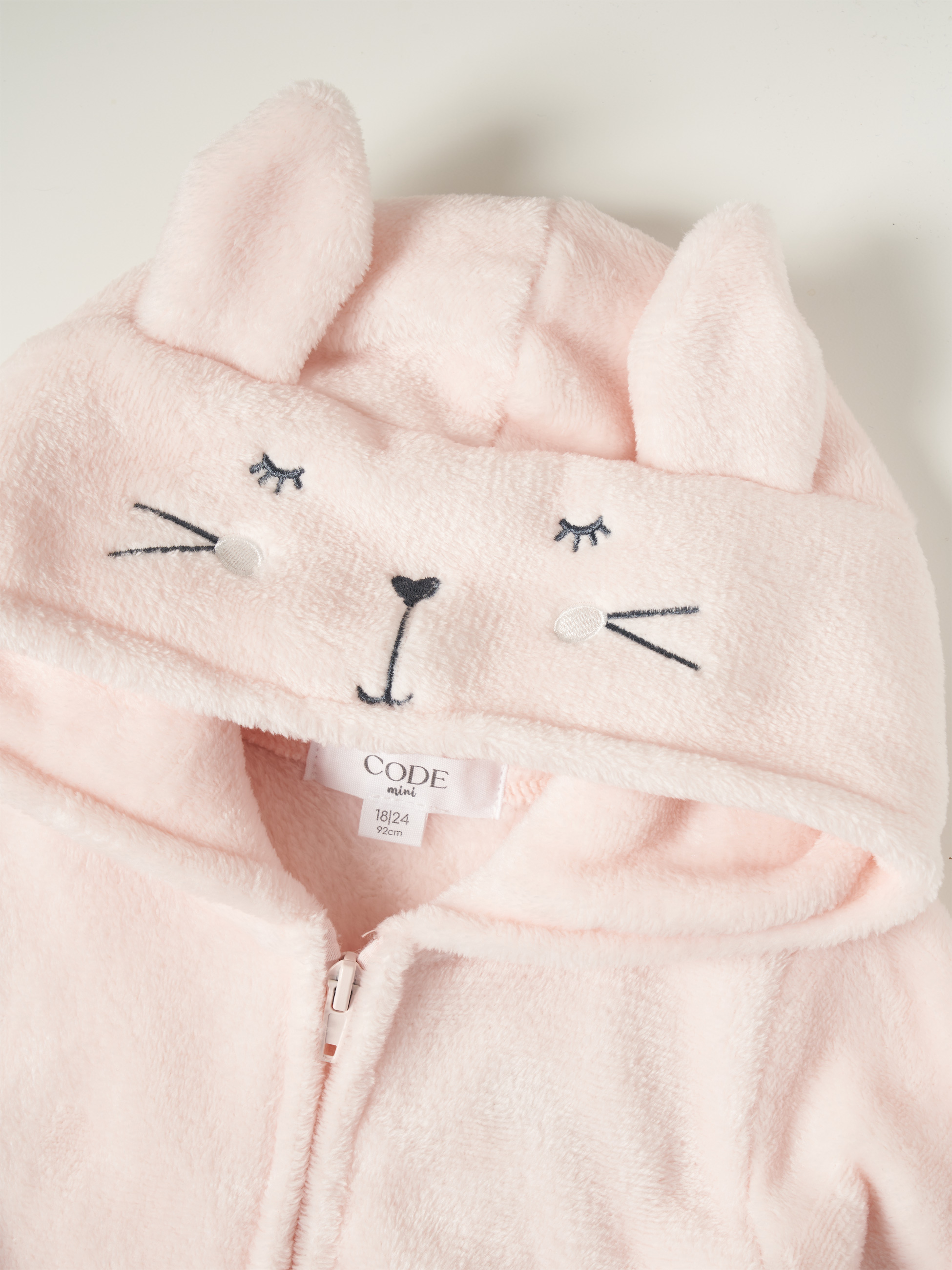 Pijama macacão com capuz