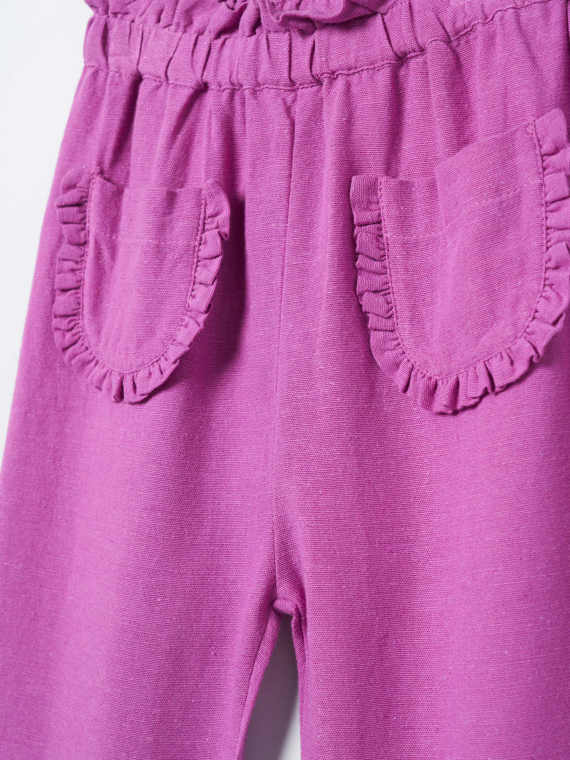 Calças largas elásticas