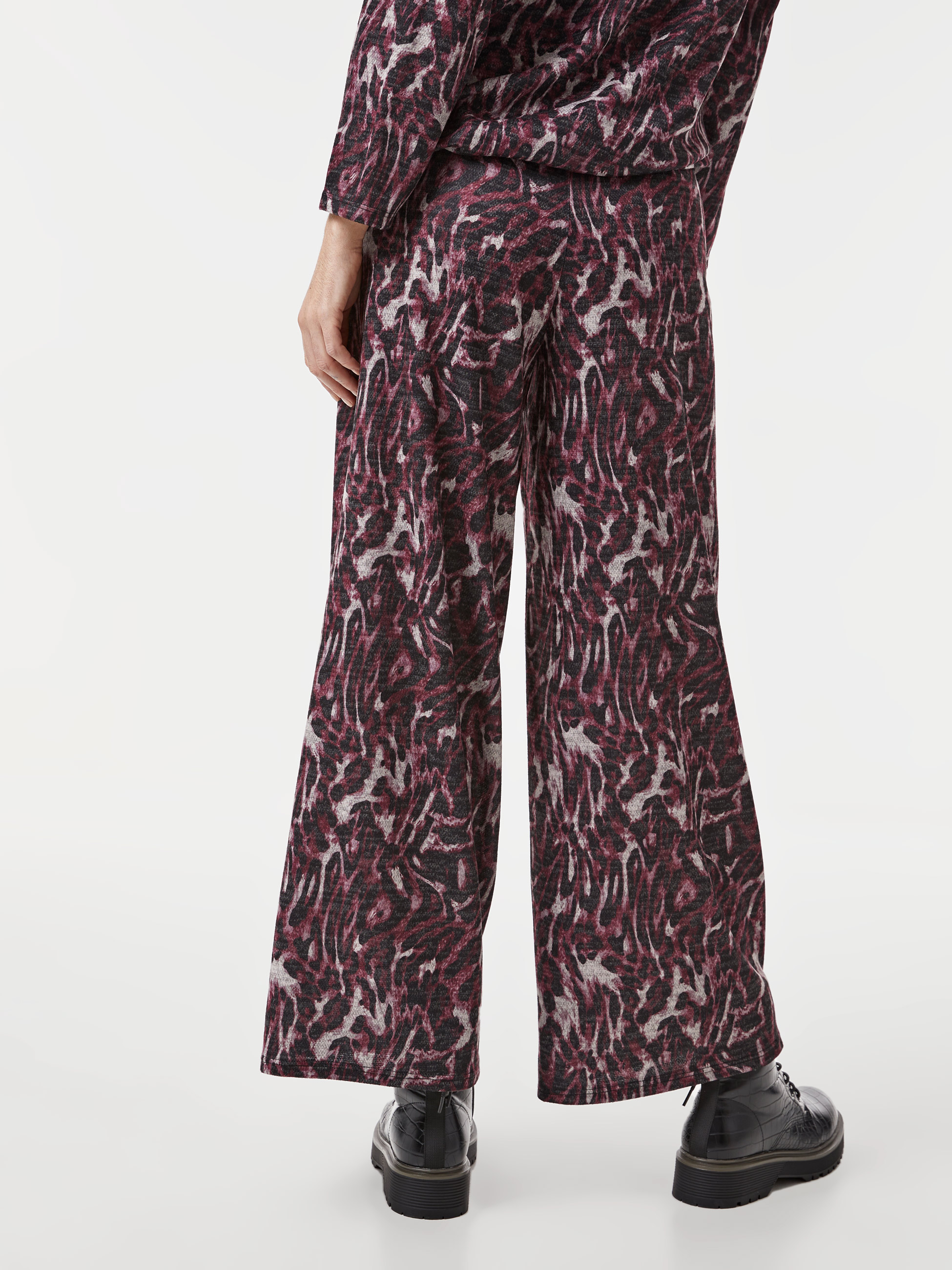 Calças em malha estampadas