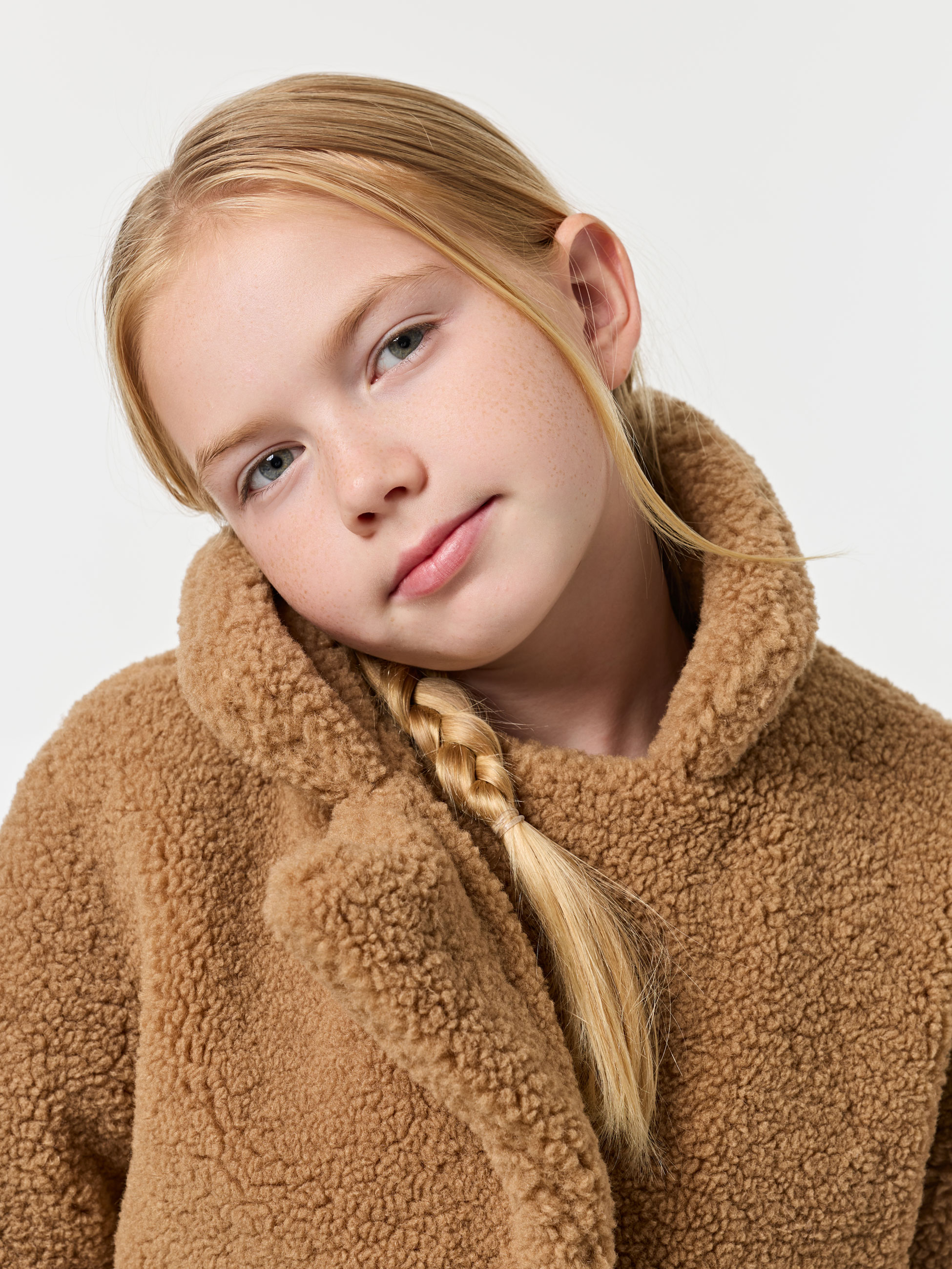 Casaco de pelo encaracolado