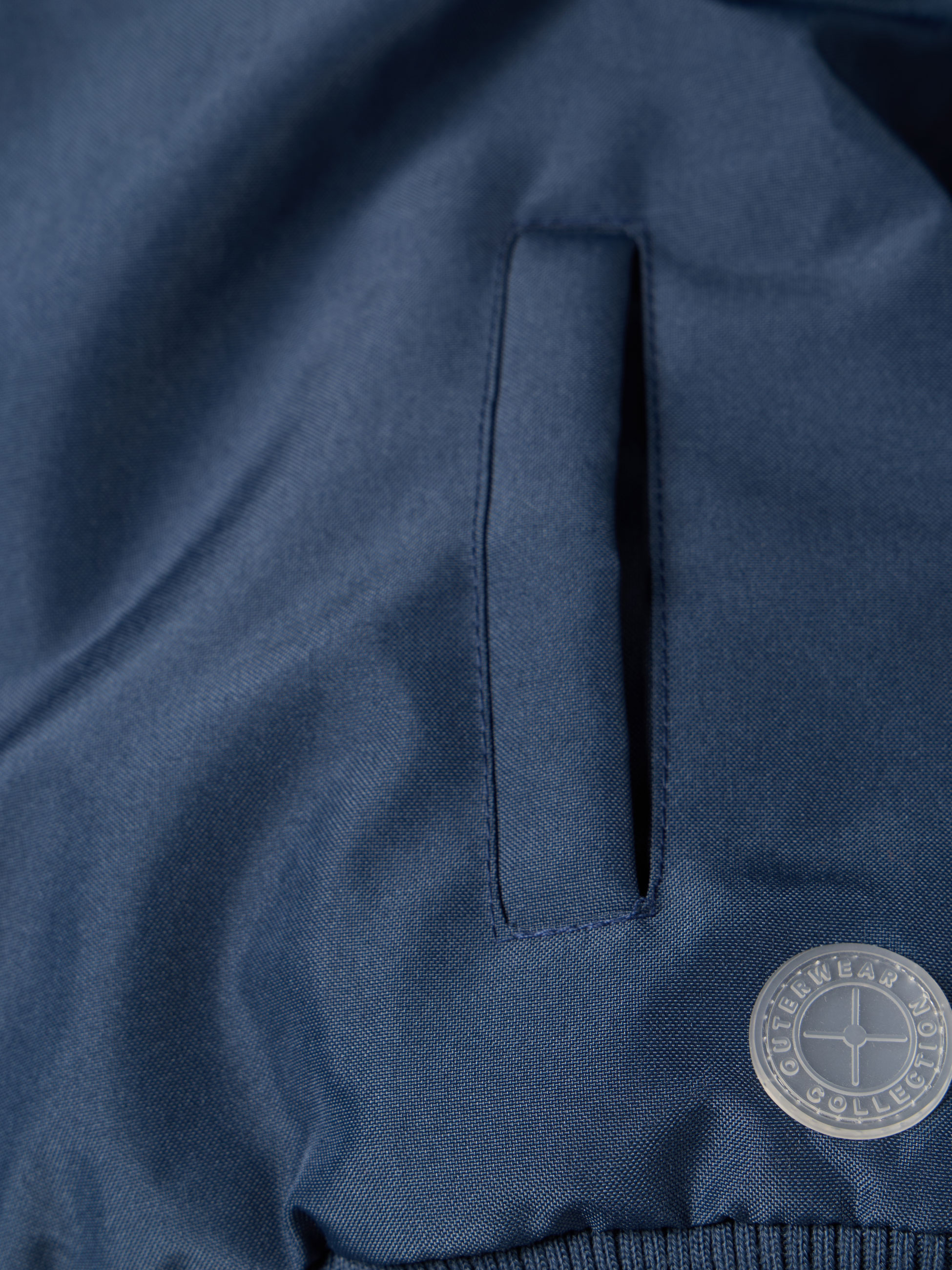 Casaco com carapuço