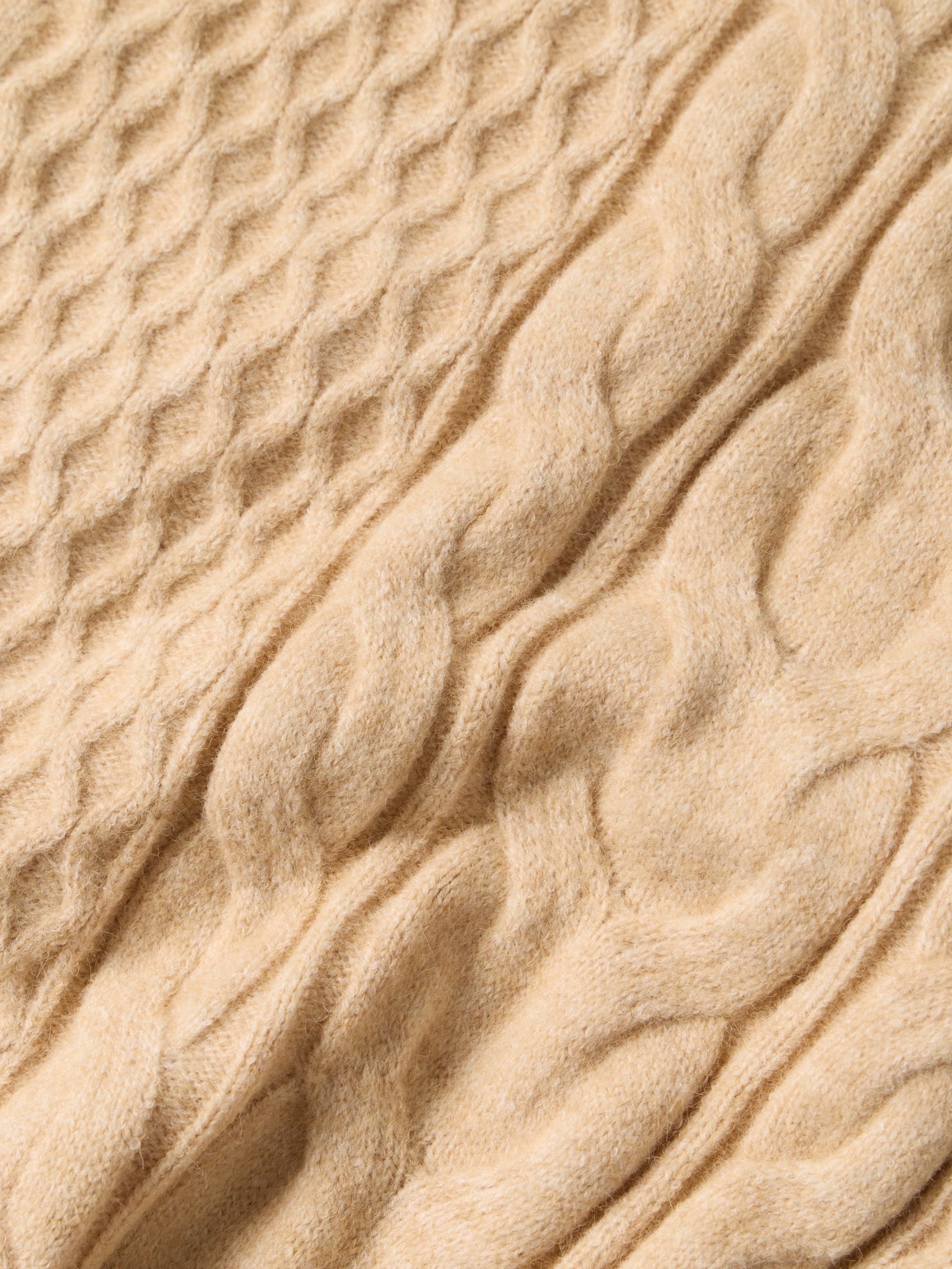 Colete em malha entrançada