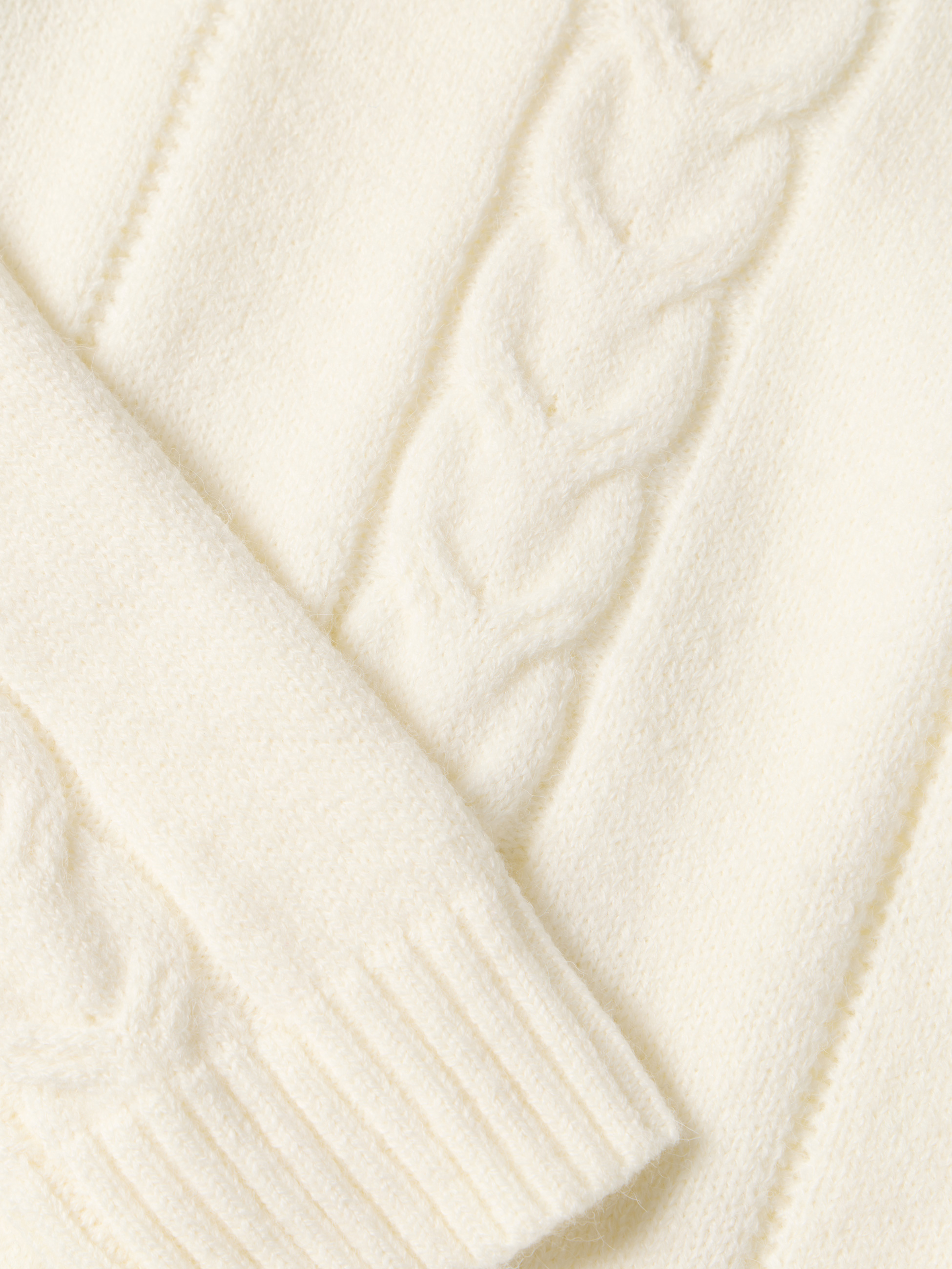 Camisola de malha entrançada