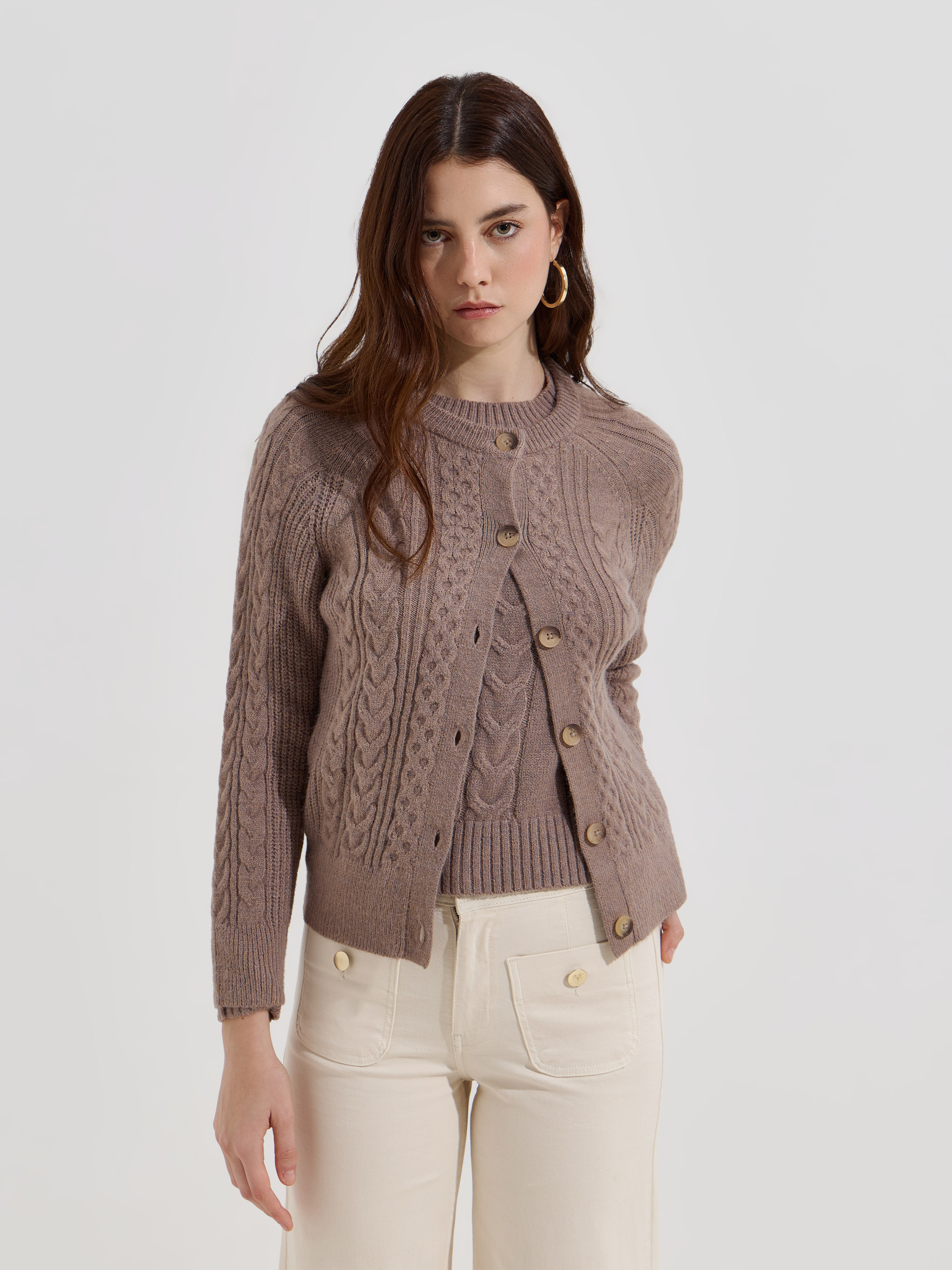 Casaco de malha entrançada