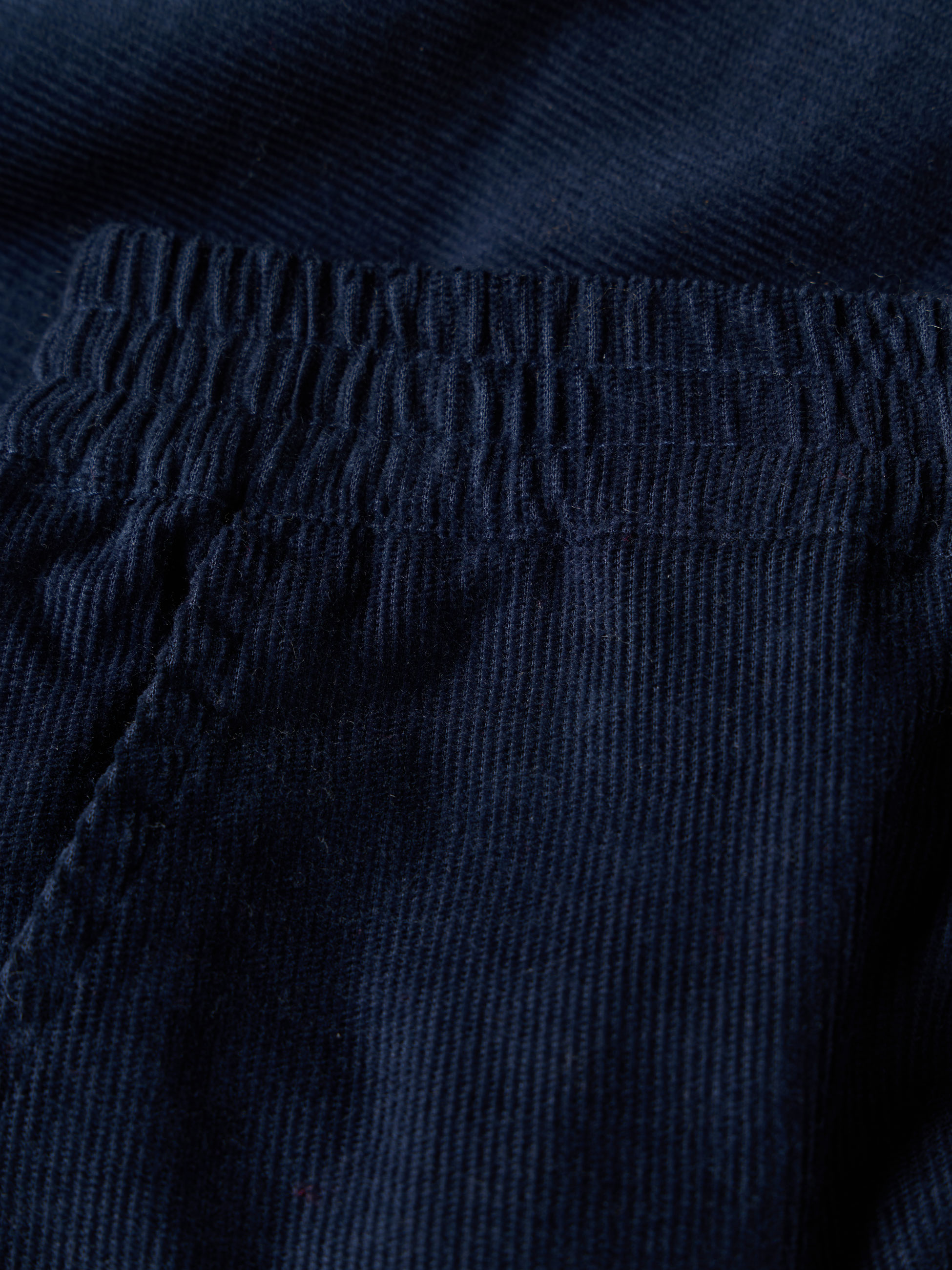 Calças de bombazine