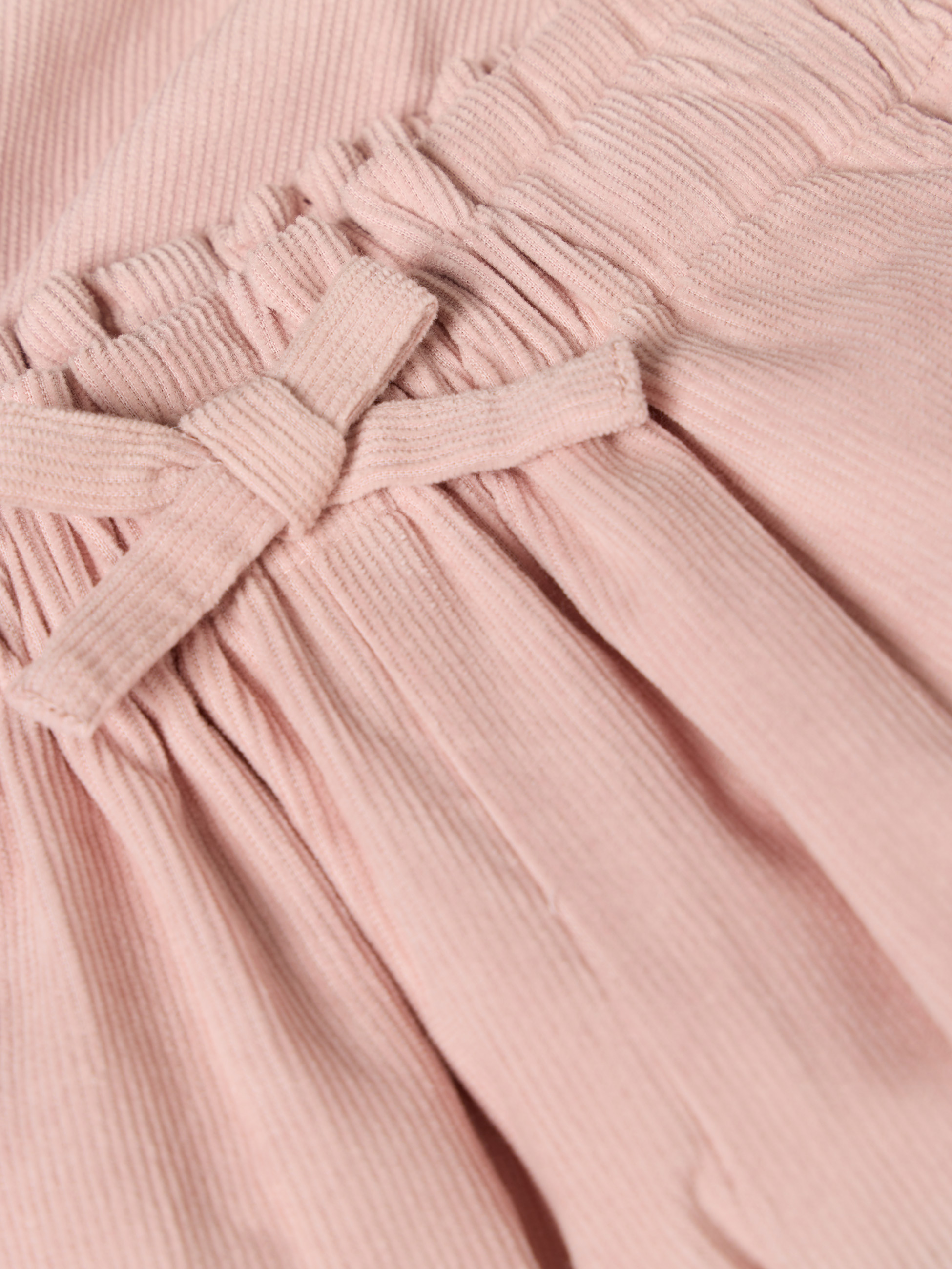 Calças de bombazine