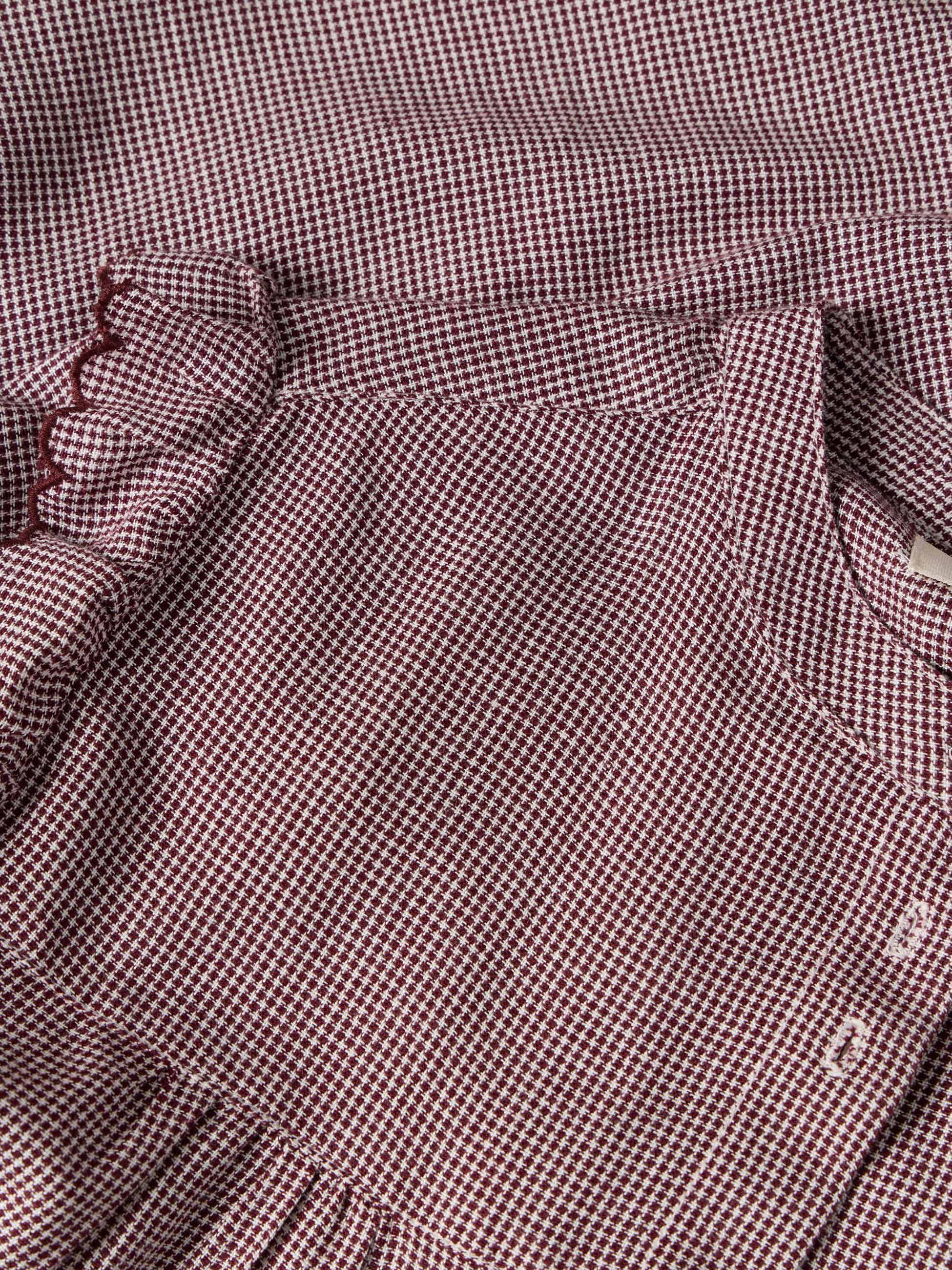 Camisa com folho nos ombros