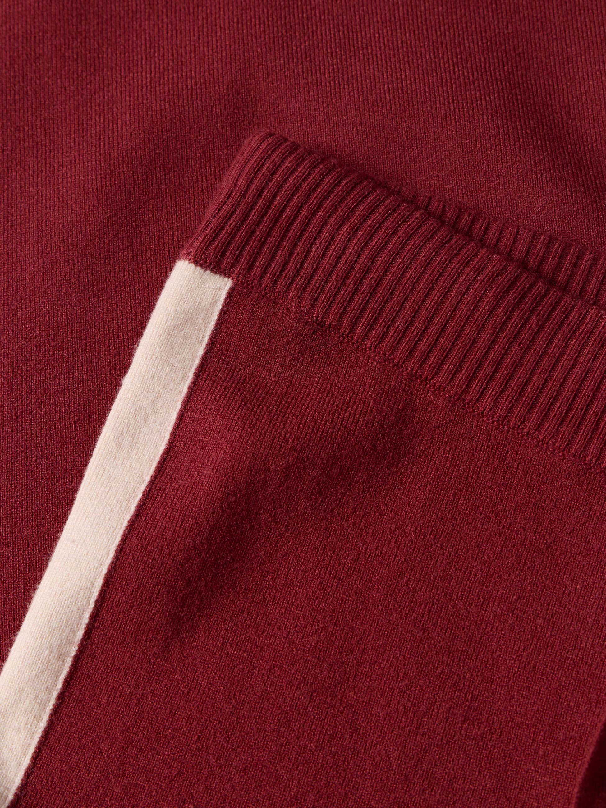 Calças de malha com risca lateral