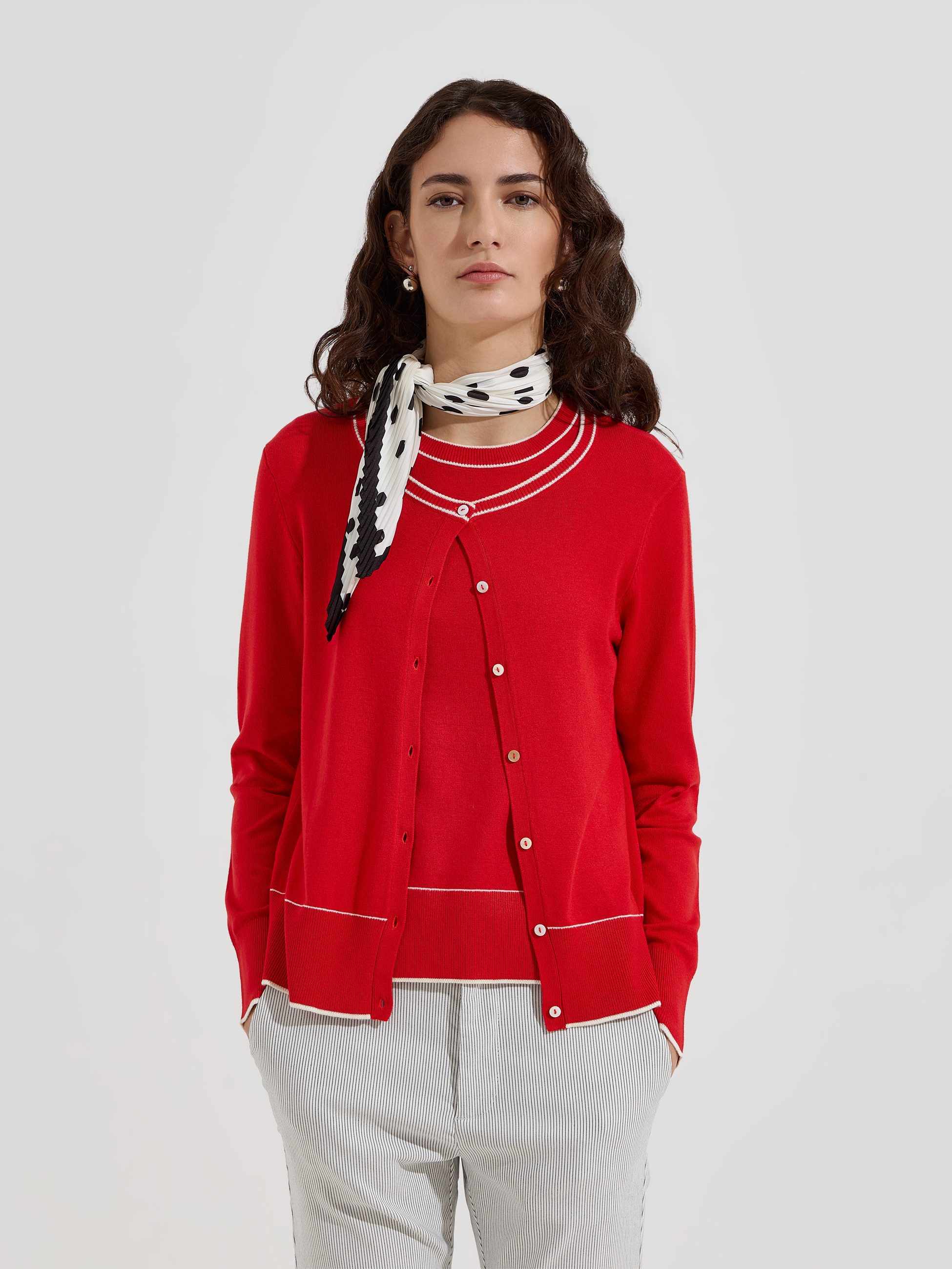 Casaco de malha com detalhes em contraste