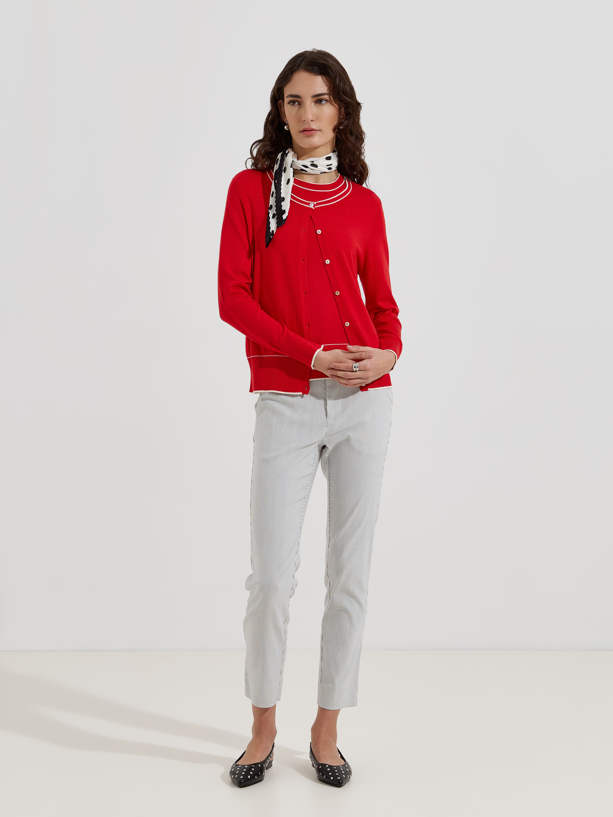 Casaco de malha com detalhes em contraste