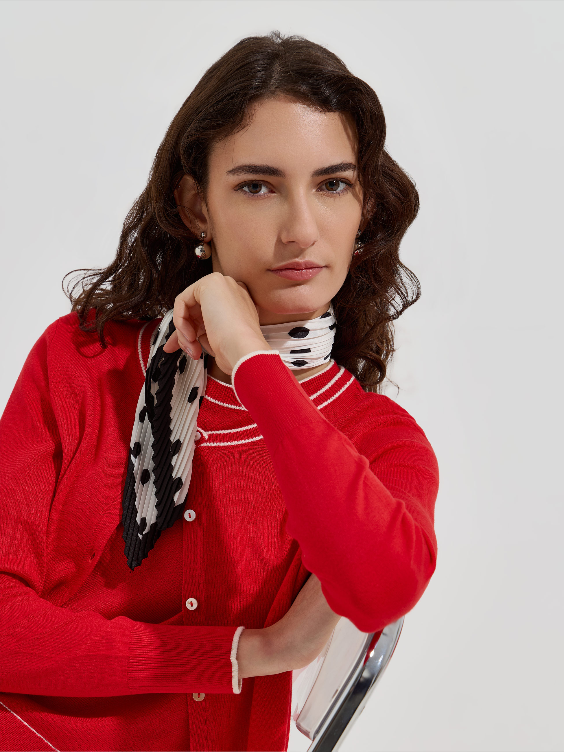 Casaco de malha com detalhes em contraste