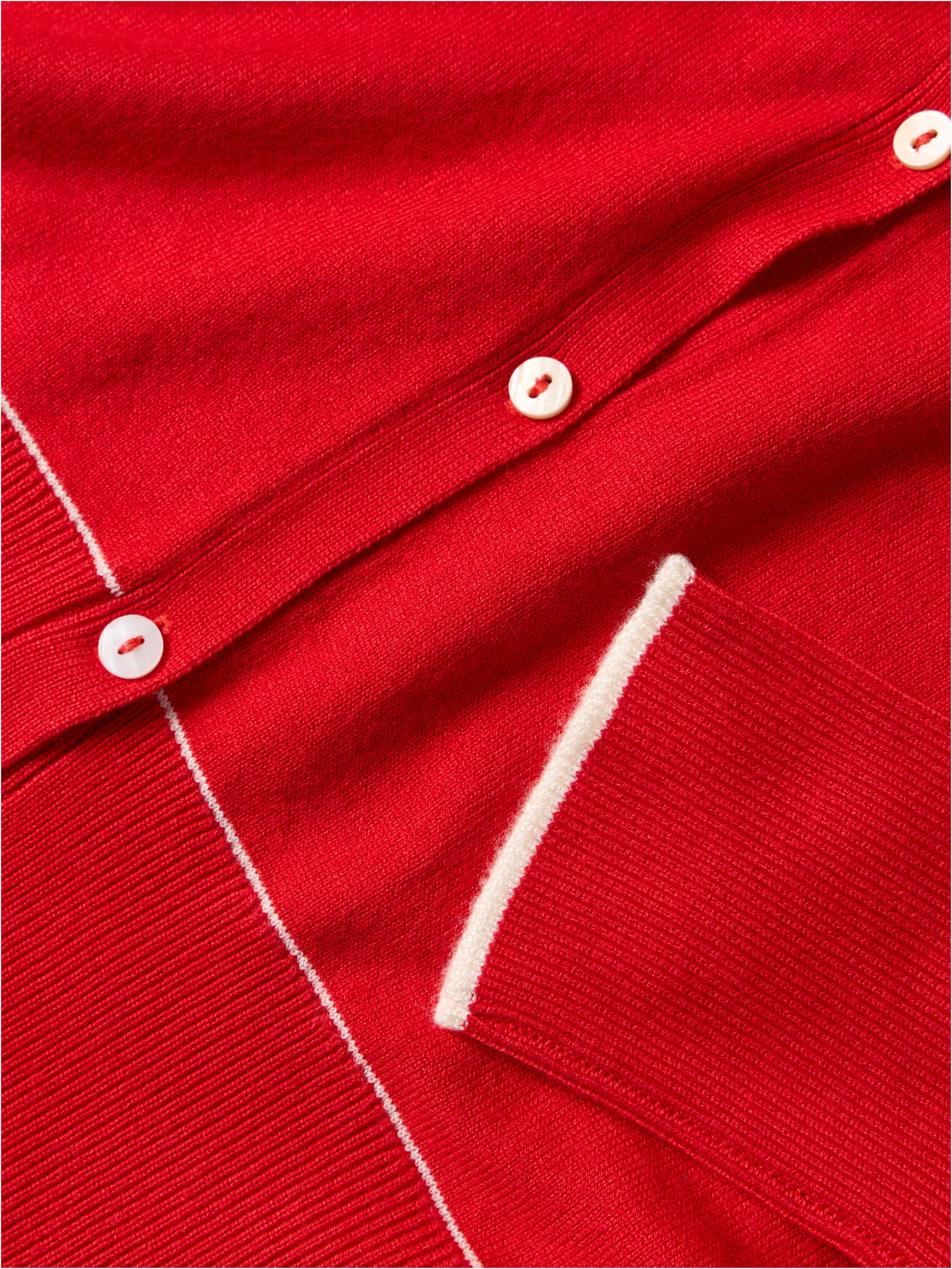 Casaco de malha com detalhes em contraste