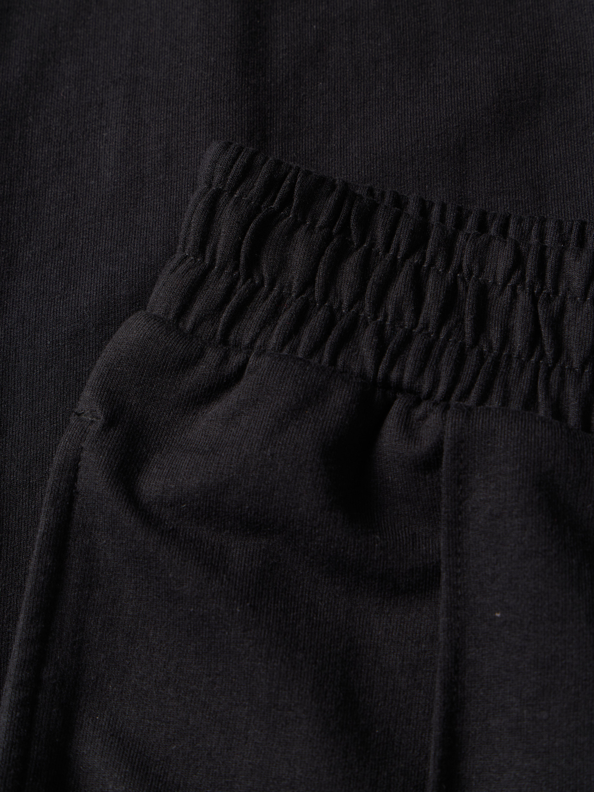 Calças em felpa com nervura