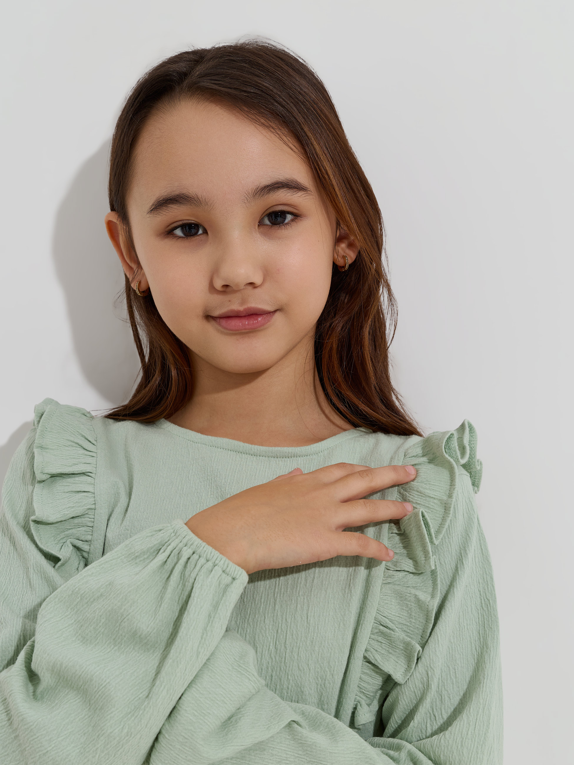 Blusa com folhos nos ombros