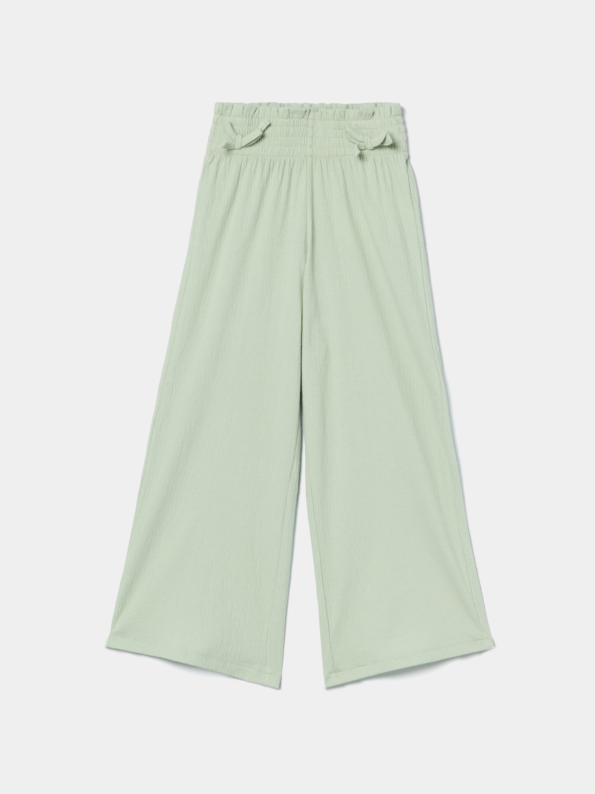 Calças fluídas com laços