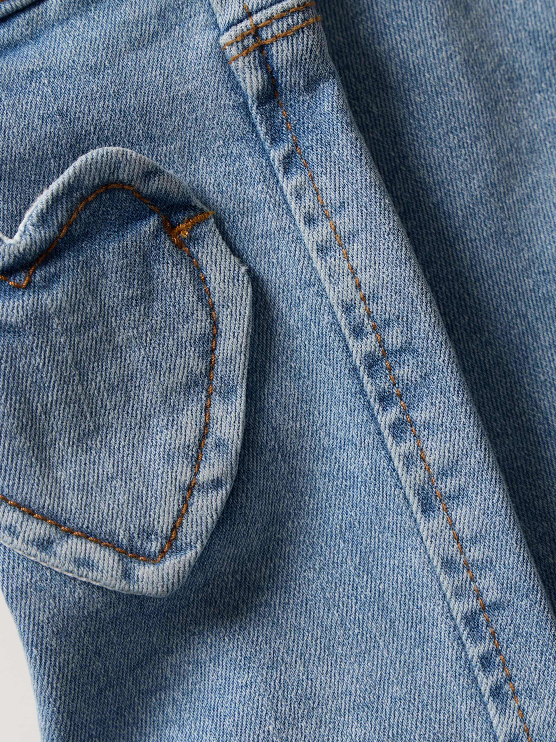 Calças de ganga com bolsos de coração