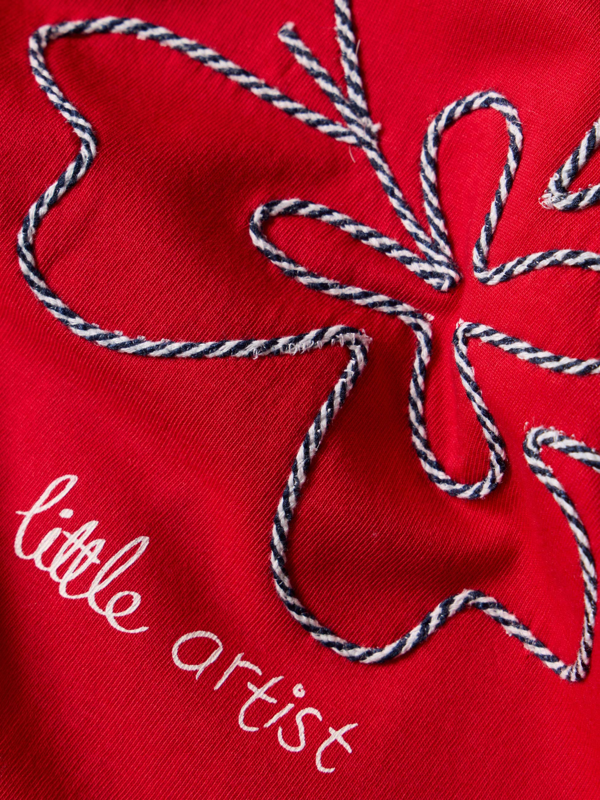 T-shirt com flor e estampado