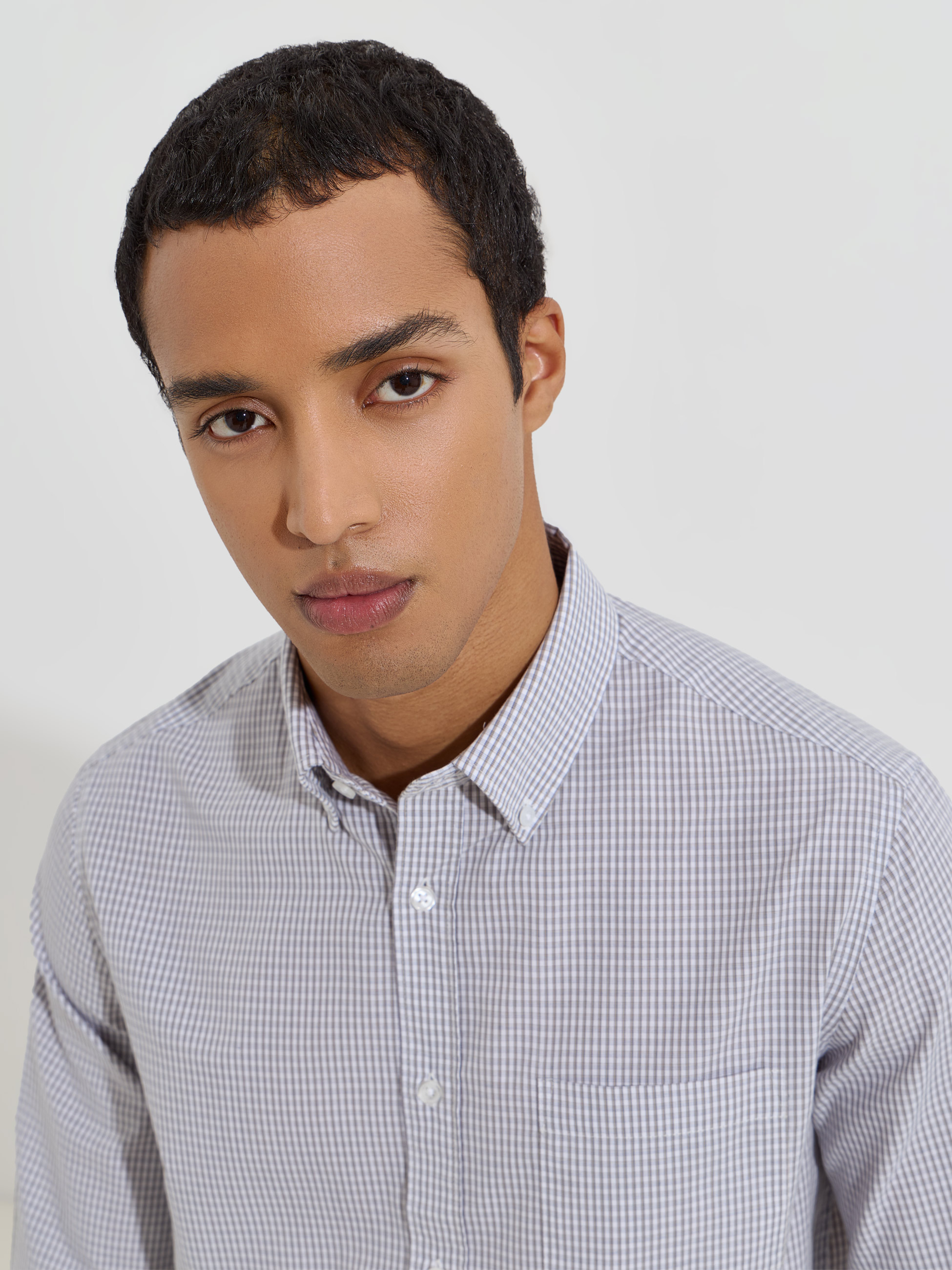 Camisa aos quadrados com bolso