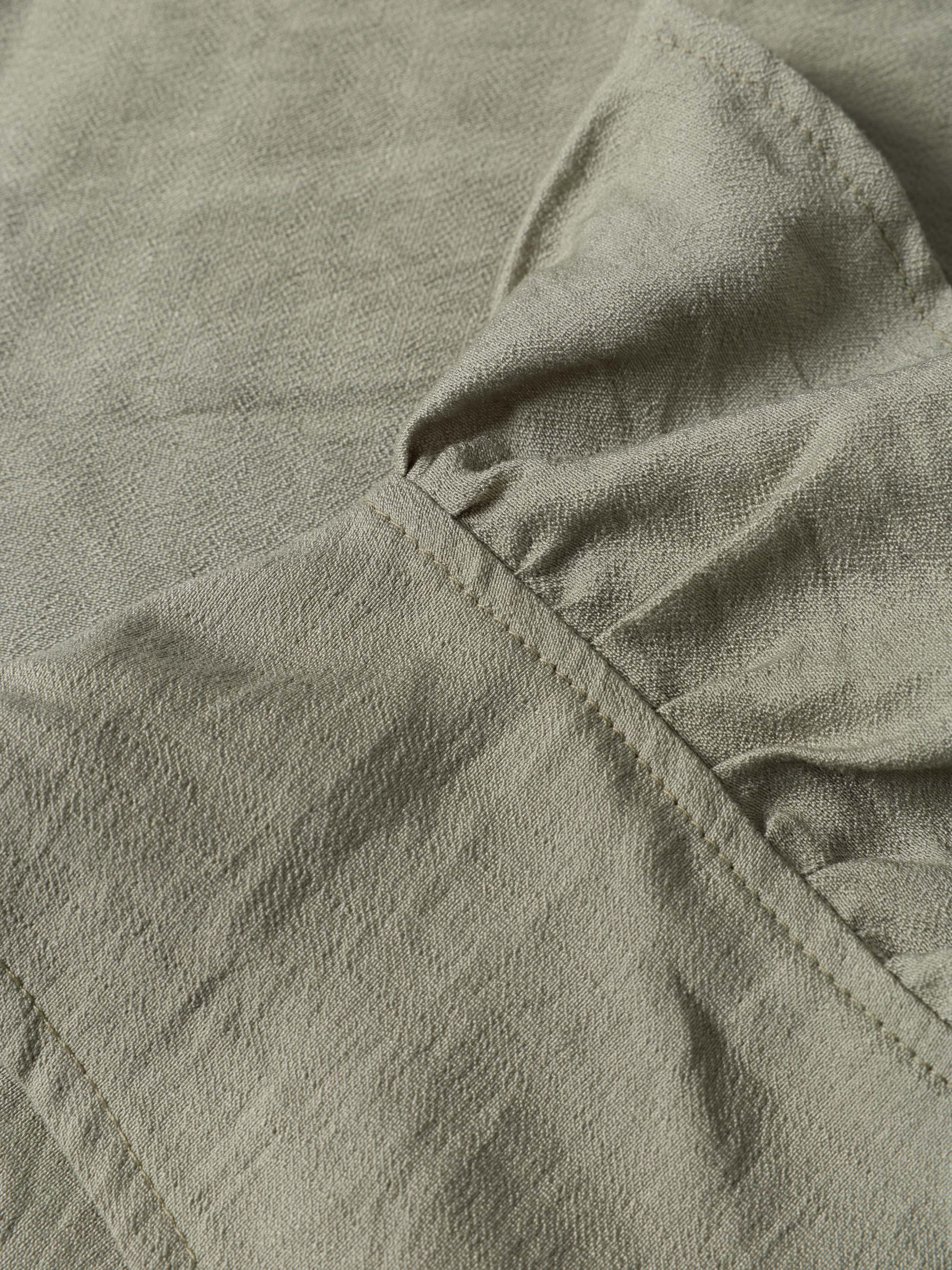 Blusa com folhos nas mangas