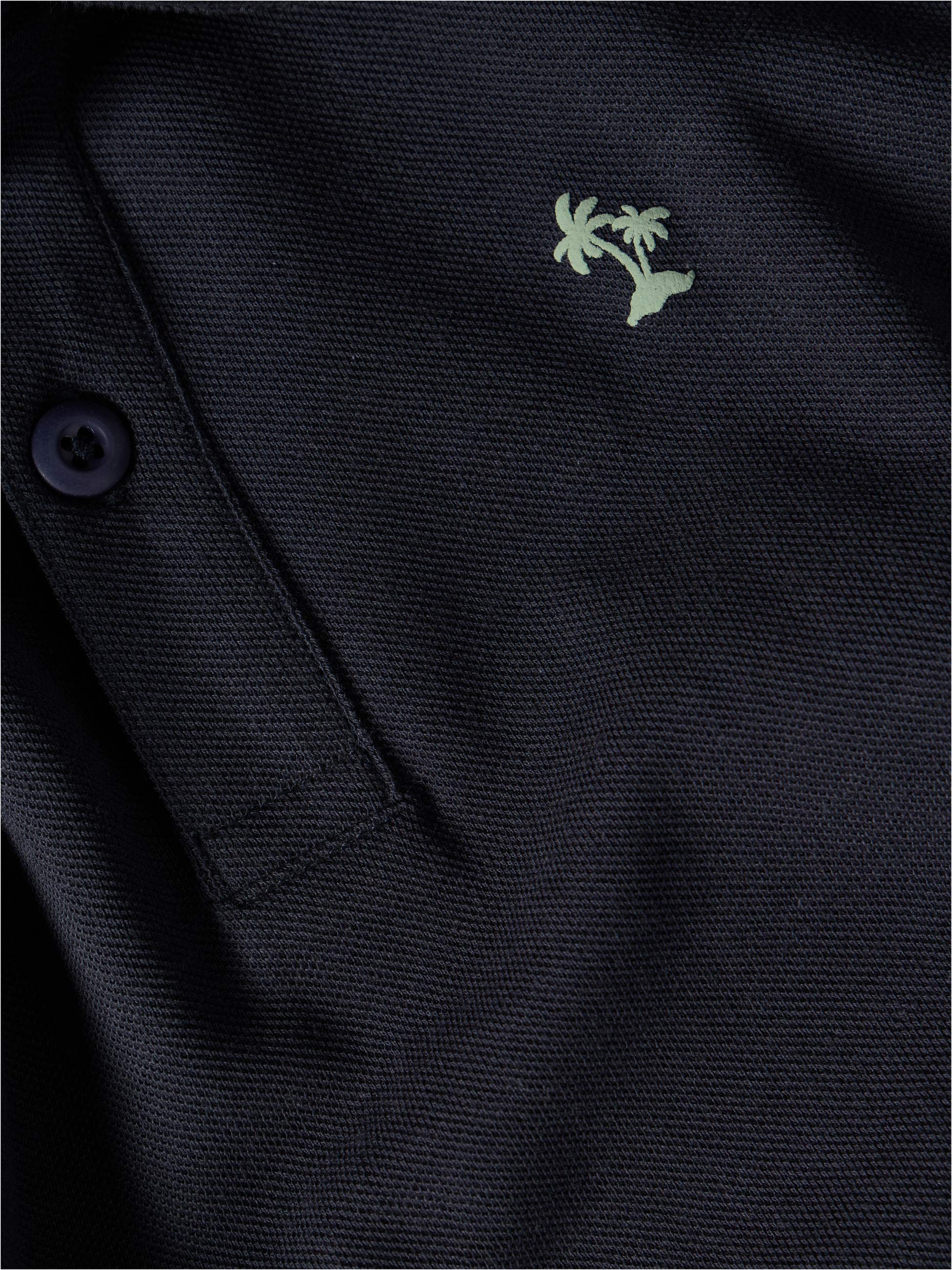 Polo em malha piquet com estampado