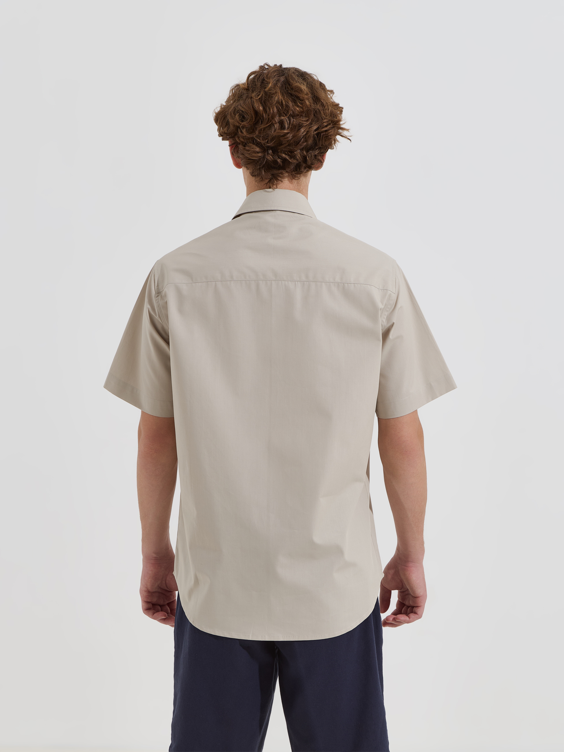 Camisa de manga curta com bolso