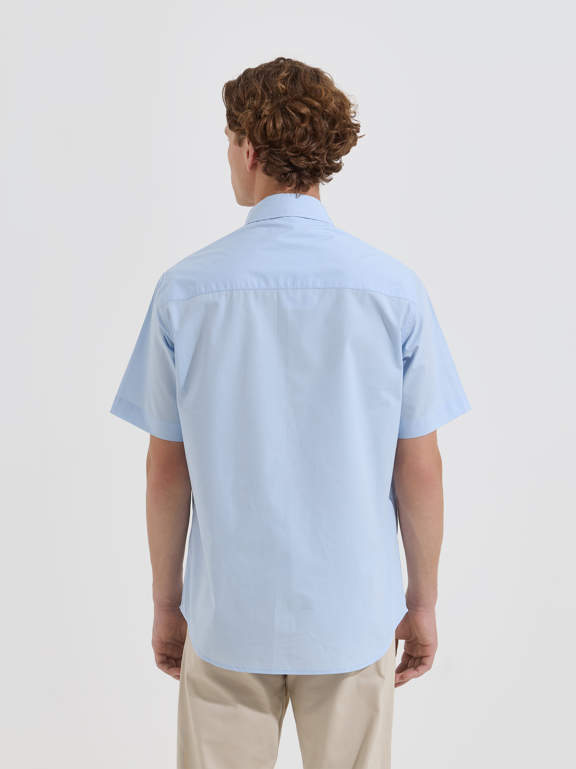 Camisa de manga curta com bolso