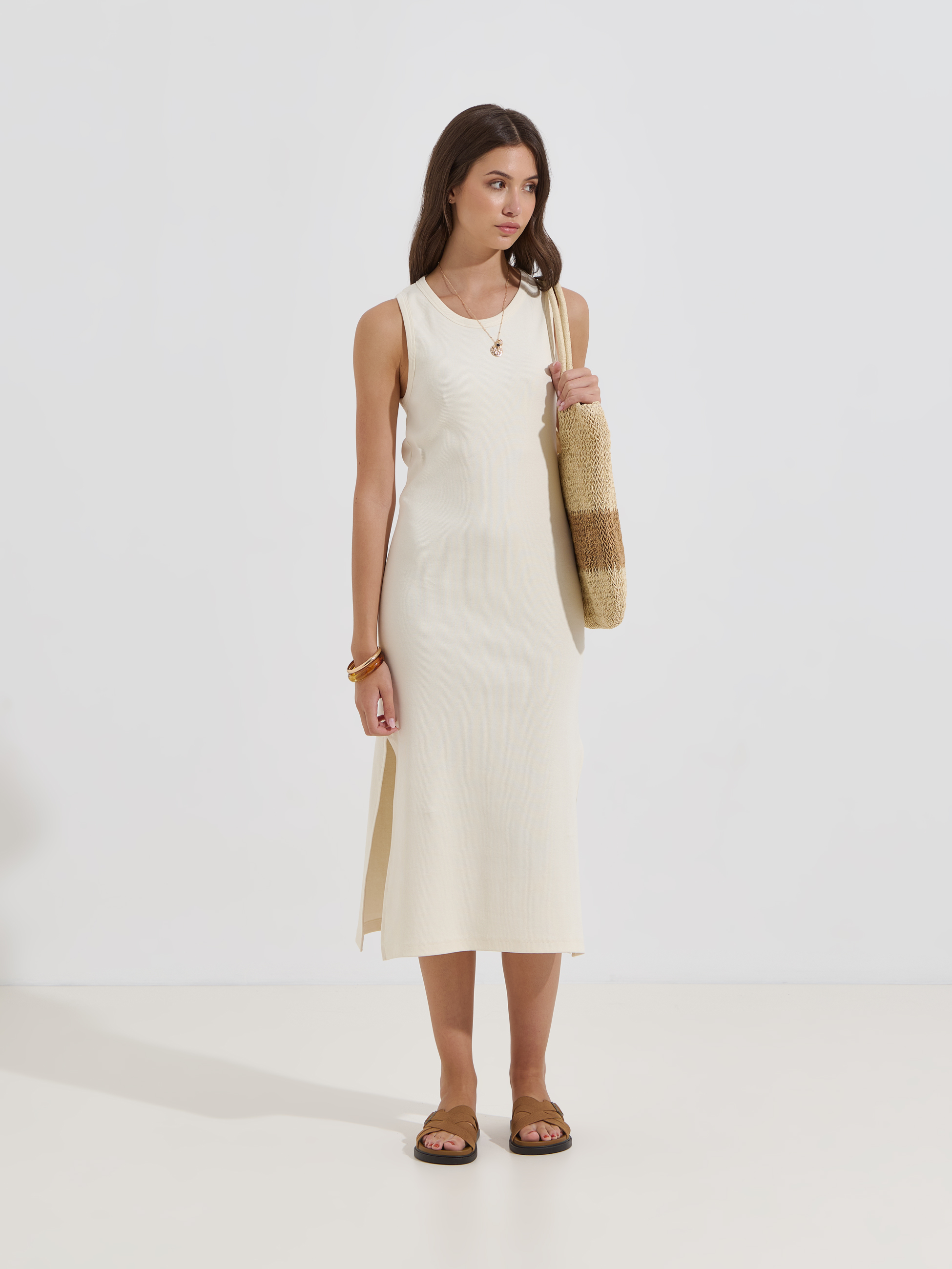 Ribbed midi dress with slit.