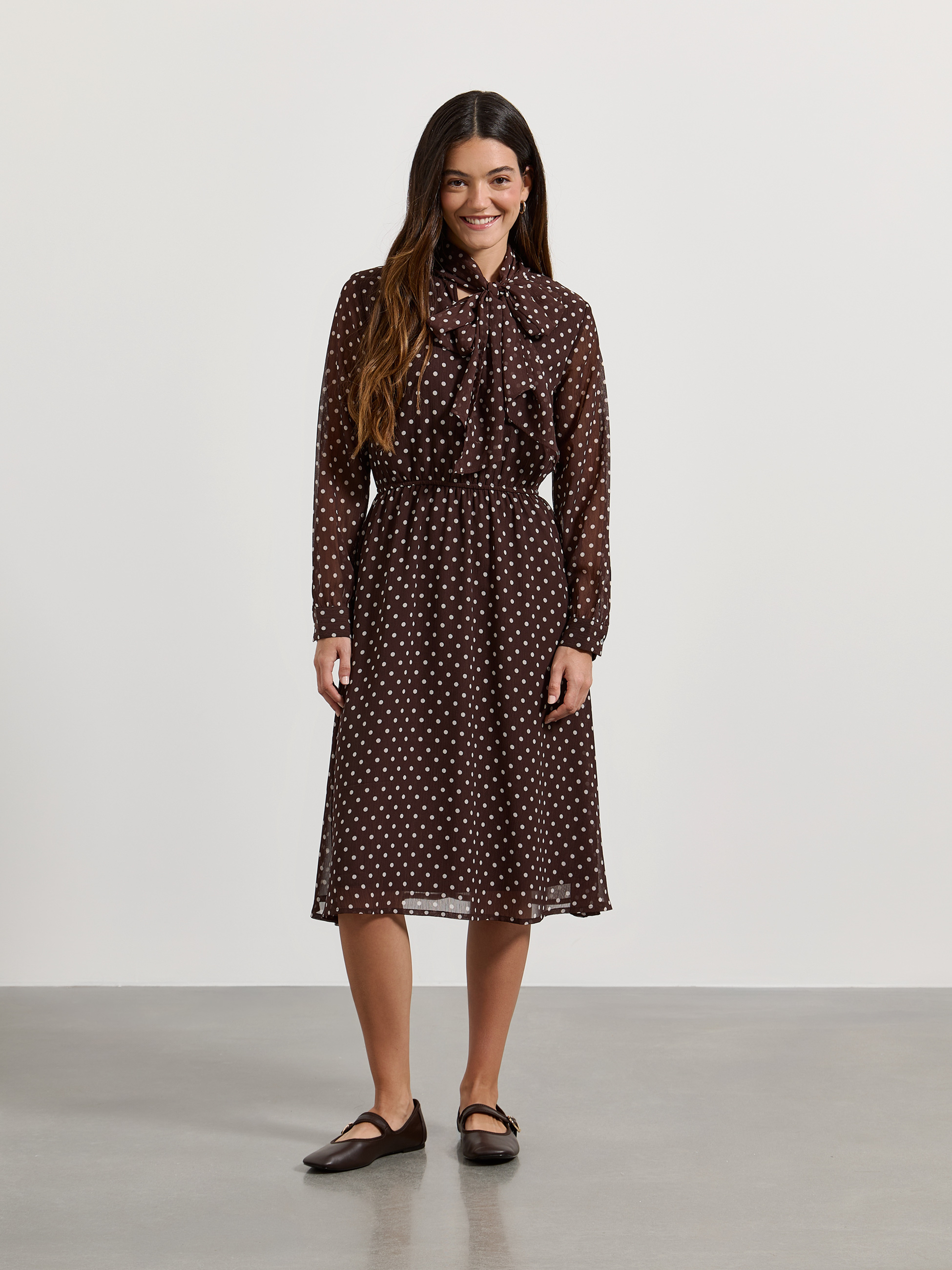 Polka dot dress with bow