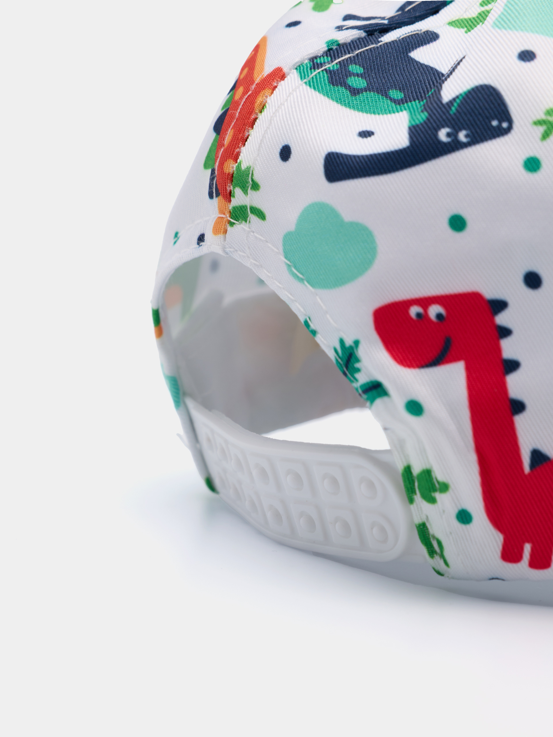 Boné com estampado de dinossauros