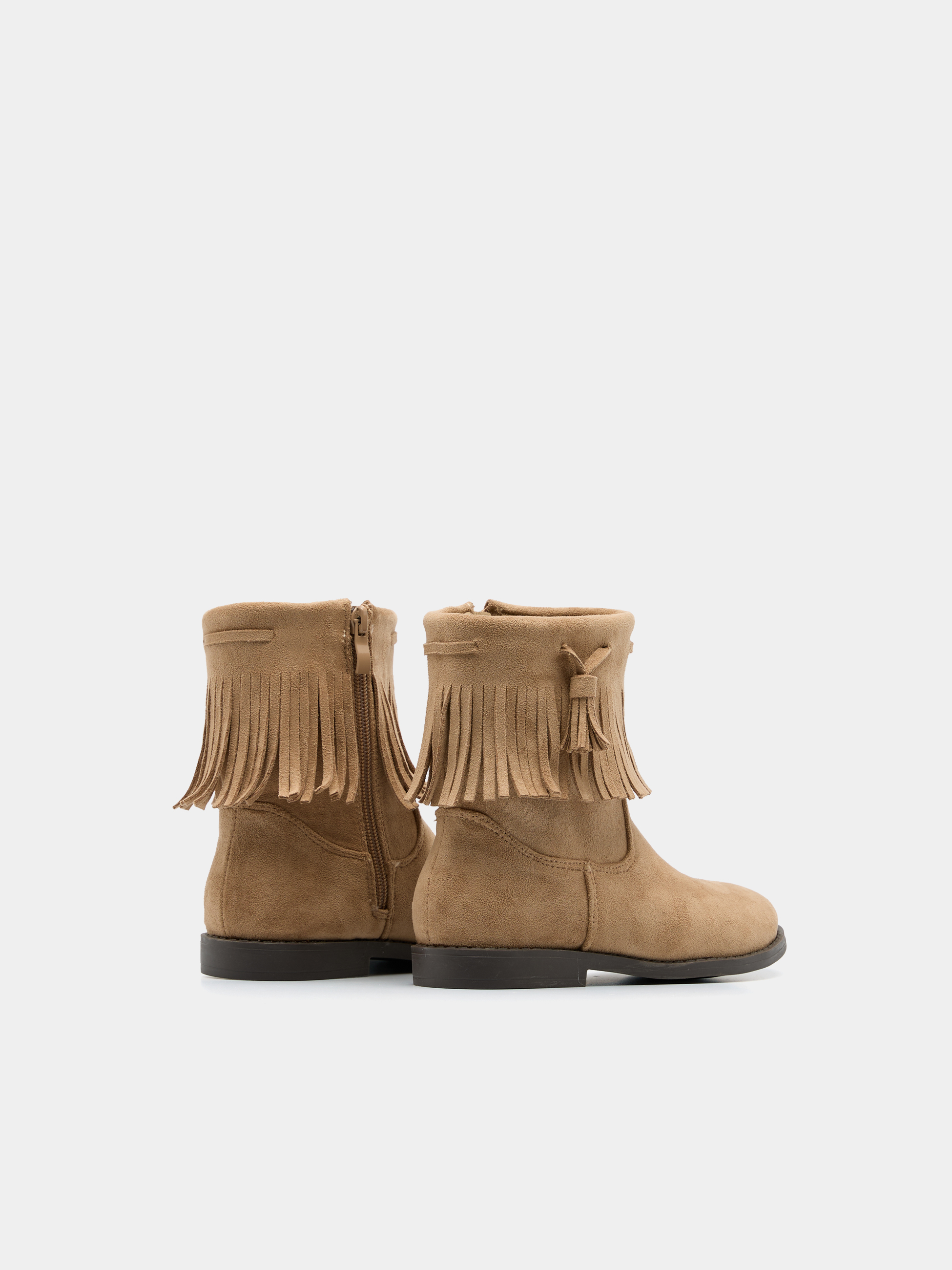 Botas com franjas