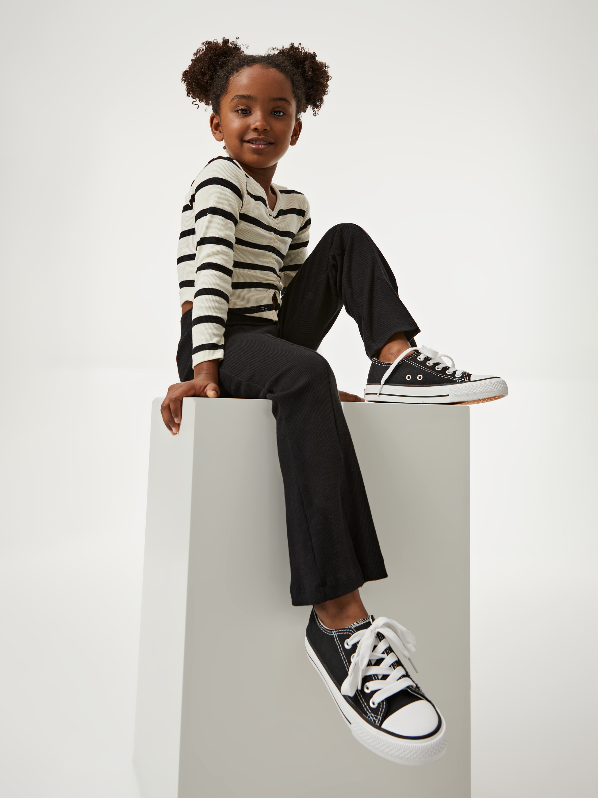 Calças malha canelada