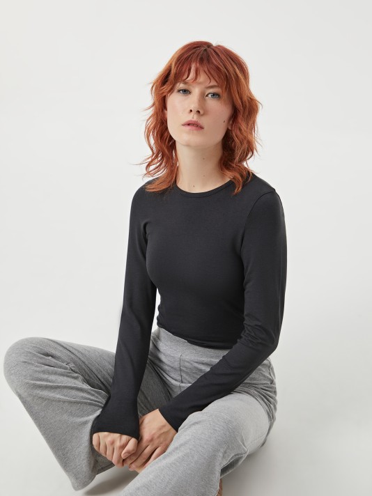 Calças malha flare Calças malha flare