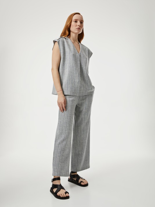 Calças com cintura elástica Calças com cintura elástica