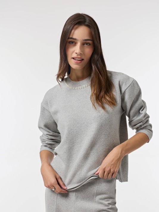 Camisola com apliques Camisola com apliques