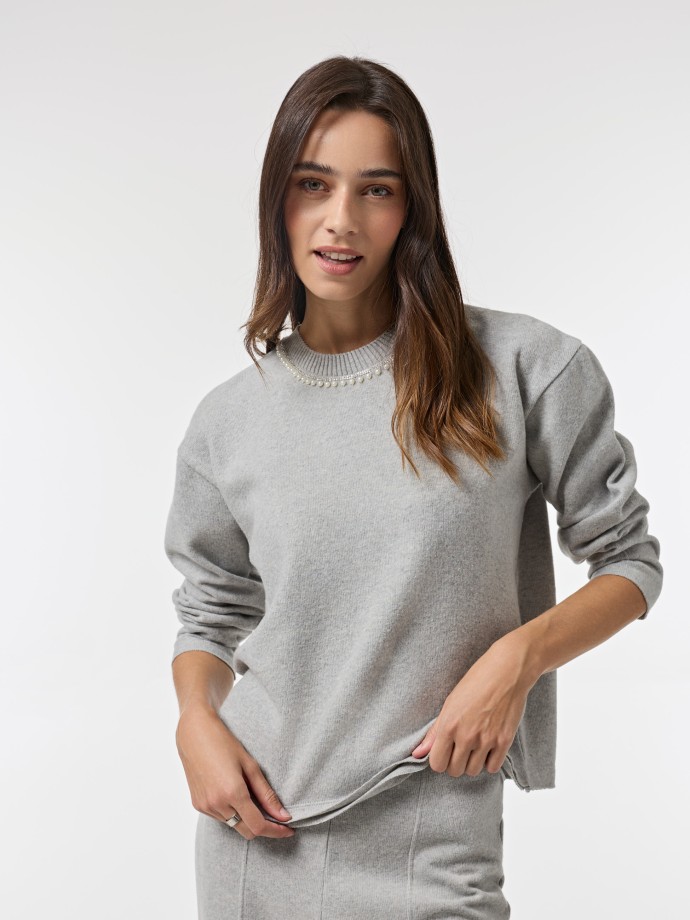 Camisola com apliques Camisola com apliques