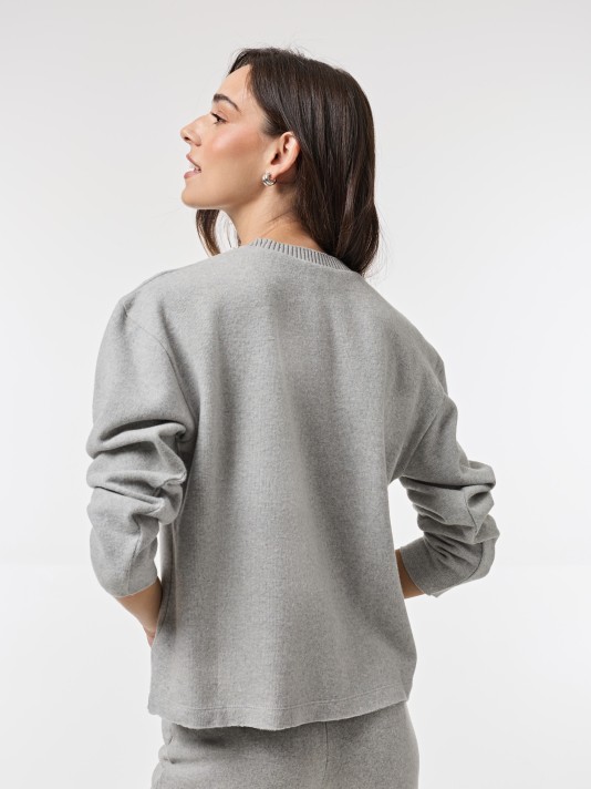 Camisola com apliques Camisola com apliques