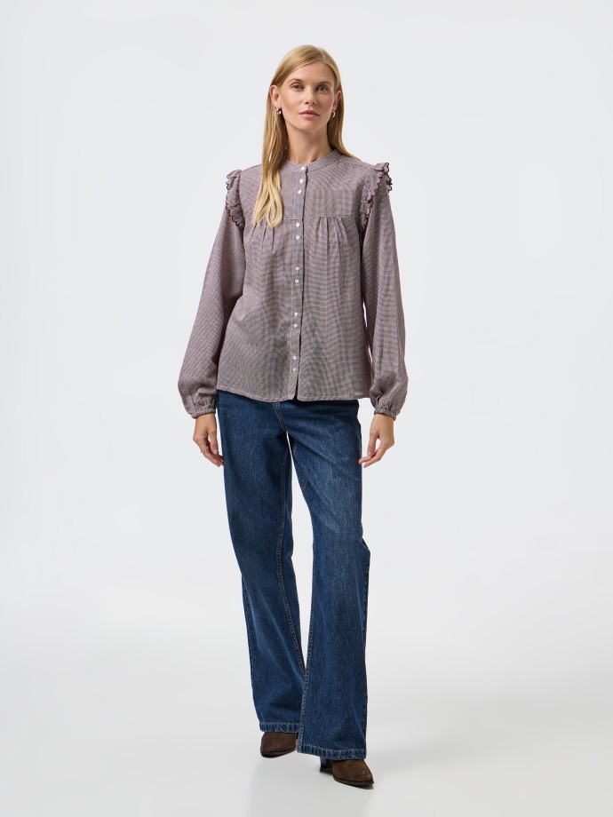 Camisa com folho nos ombros