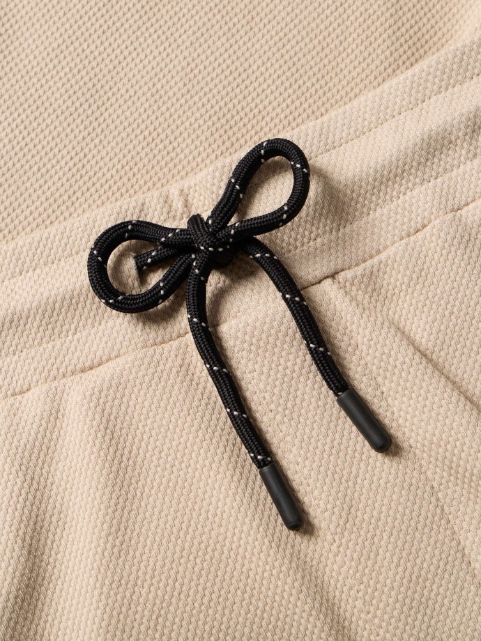 Cal�as em malha piquet