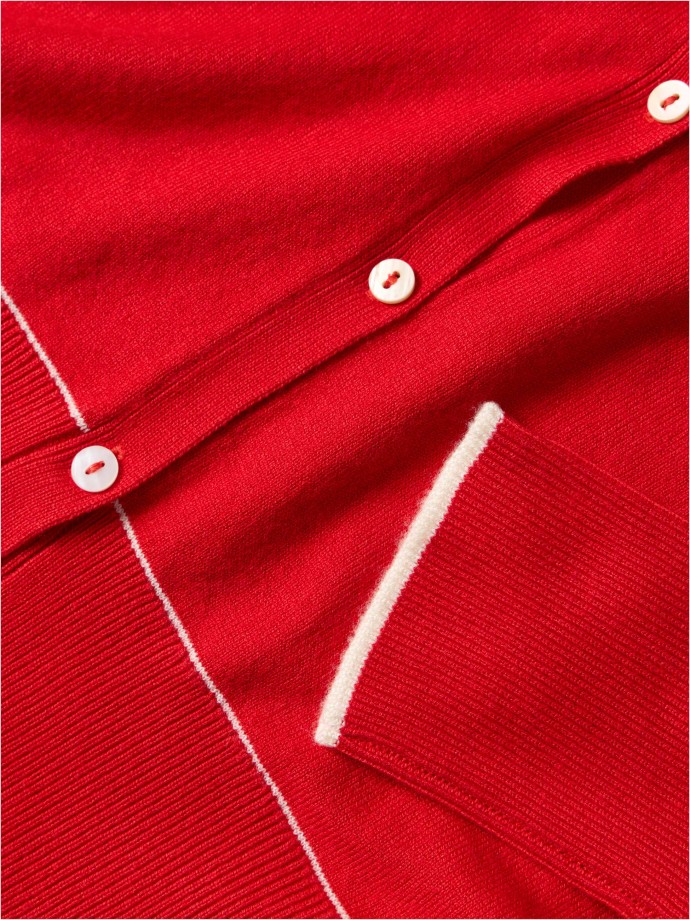 Casaco de malha com detalhes em contraste