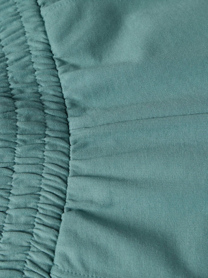 Cal�as em felpa com nervura