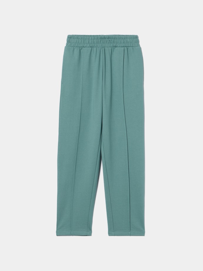 Cal�as em felpa com nervura