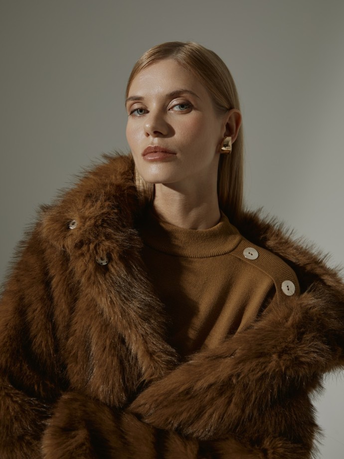 Casaco de pelo com carapuo