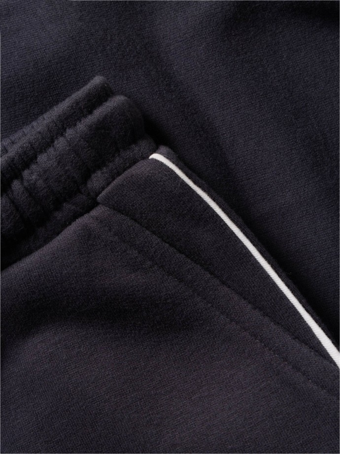 Cal�as de felpa com risca lateral